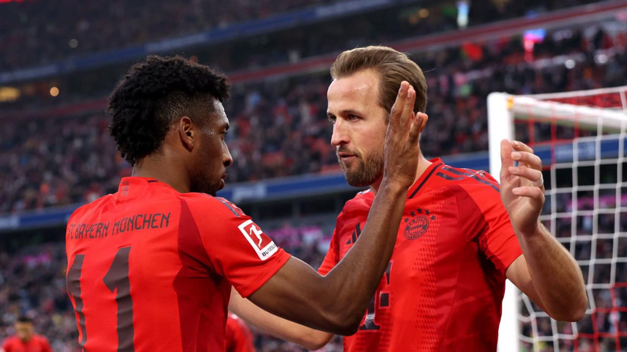 MUNICH, GERMANY - NOVEMBER 02: Kingsley Coman of Bayern Munich celebrates scoring his team's second goal with teammate Harry Kane during the Bundesliga match between FC Bayern München and 1. FC Union Berlin at Allianz Arena on November 02, 2024 in Munich, Germany. (Photo by Alexander Hassenstein/Getty Images)