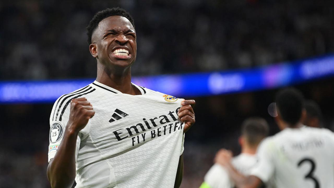 MADRID, SPAIN - OCTOBER 22: Vinicius Junior of Real Madrid celebrates scoring his team's fifth goal during the UEFA Champions League 2024/25 League Phase MD3 match between Real Madrid C.F. and Borussia Dortmund at Estadio Santiago Bernabeu on October 22, 2024 in Madrid, Spain. (Photo by Denis Doyle/Getty Images)