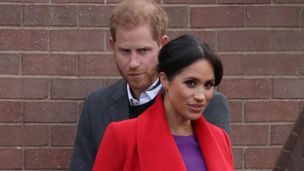 BIRKENHEAD, ENGLAND - JANUARY 14: Prince Harry, Duke of Sussex and Meghan, Duchess of Sussex visit 'Tomorrow's Women Wirral' Charity on January 14, 2019 in Birkenhead, United Kingdom. (Photo by Neil Mockford/GC Images)