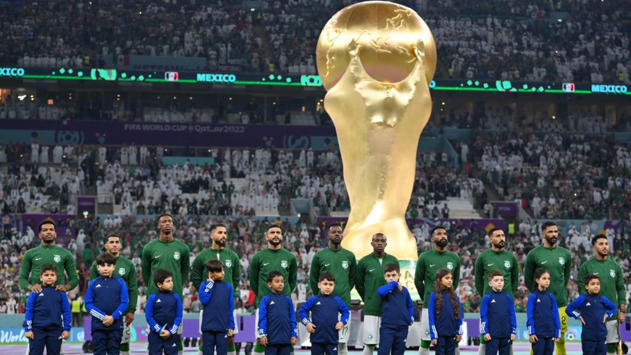 LUSAIL CITY, QATAR - NOVEMBER 30: Saudi Arabia players line up for the national anthem prior to the FIFA World Cup Qatar 2022 Group C match between Saudi Arabia and Mexico at Lusail Stadium on November 30, 2022 in Lusail City, Qatar. (Photo by Justin Setterfield/Getty Images)