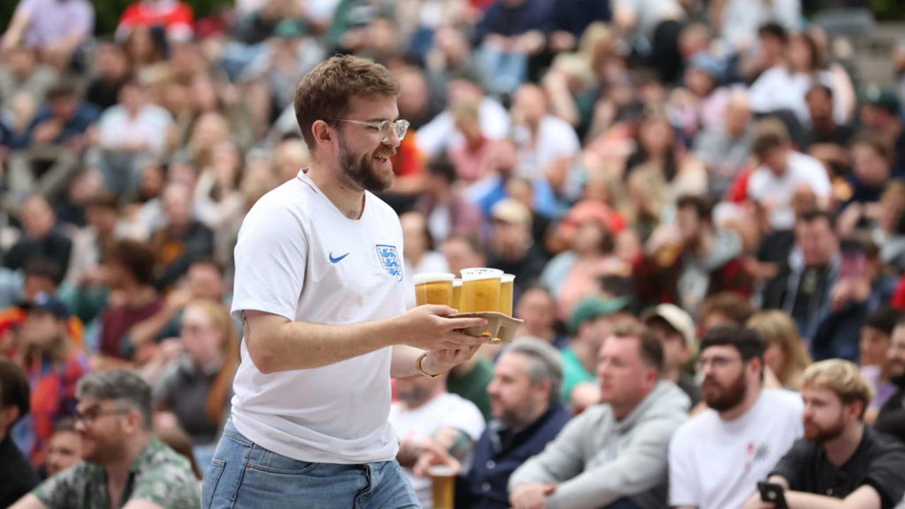 GLASGOW, SCOTLAND - JULY 14: Spectators gather at the Queen's Park Arena open-air screening of  the Euro 2024 final between Spain and England, managed and hosted by Inhouse Events CIC, on July 14, 2024, in Glasgow, Scotland.  (Photo by Alan Harvey/SNS Group via Getty Images)