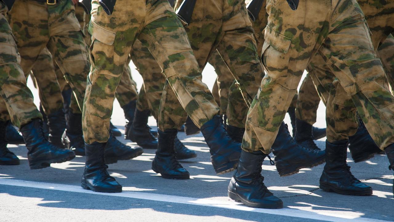 Soldiers in dress uniform marching in the parade