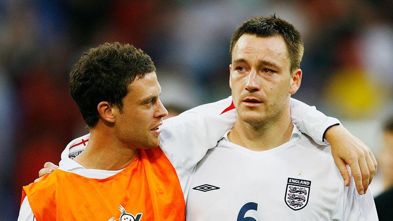 GELSENKIRCHEN, GERMANY - JULY 01:  Wayne Bridge consoles England team mate John Terry following defeat during the FIFA World Cup Germany 2006 Quarter-final match between England and Portugal played at the Stadium Gelsenkirchen on July 1, 2006 in Gelsenkirchen, Germany.  (Photo by Shaun Botterill/Getty Images)