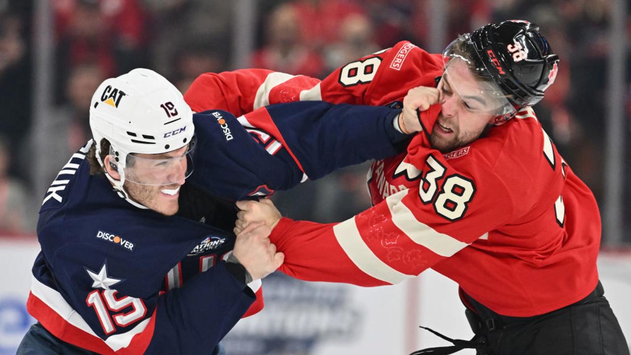 MONTREAL, CANADA - FEBRUARY 15: Matthew Tkachuk #19 of Team USA fights with Brandon Hagel #38 of Team Canada during the first period in the 4 Nations Face-Off game at the Bell Centre on February 15, 2025 in Montreal, Quebec, Canada.  (Photo by Minas Panagiotakis/Getty Images)