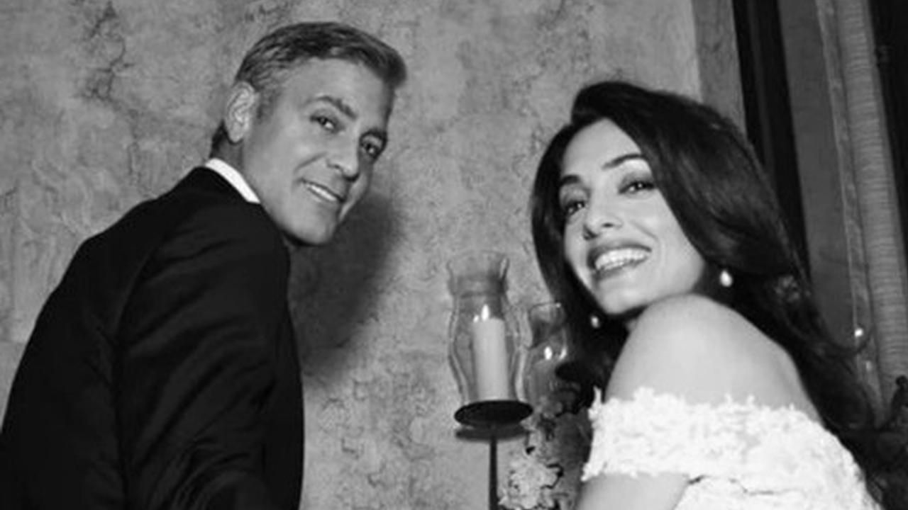 George Clooney s manželkou