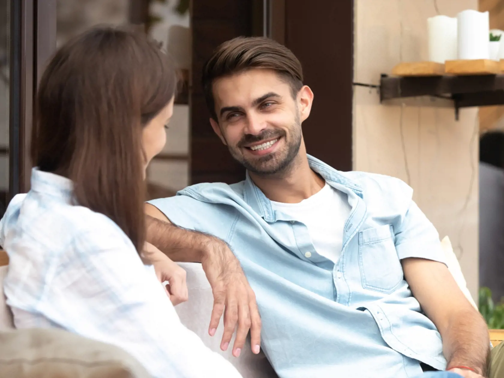 Happy,Smiling,Handsome,Man,Having,Good,Conversation,With,Young,Woman,