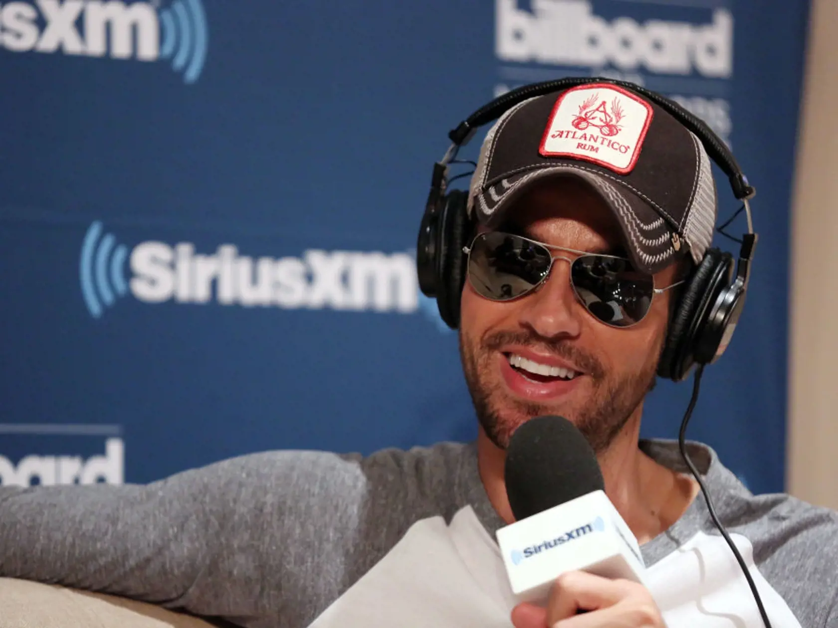 LAS VEGAS, NV - MAY 19:  Enrique Iglesias talks with The Morning Mash Up on SiriusXM Hits 1 during a backstage broadcast leading up to the Billboard Music Awards on May 19, 2018 in Las Vegas, Nevada.  (Photo by Isaac Brekken/Getty Images for SiriusXM)