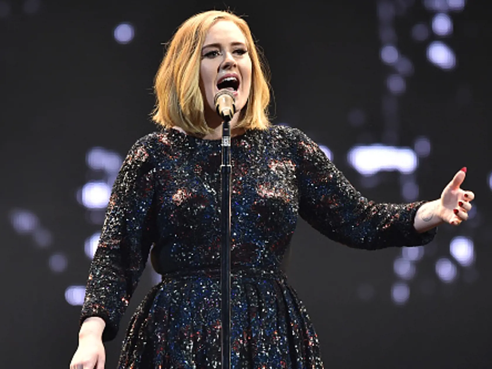 BELFAST, NORTHERN IRELAND - FEBRUARY 29:  Adele performs on stage at the SSE Arena Belfast on February 29, 2016 in Belfast, Northern Ireland.  (Photo by Gareth Cattermole/Getty Images)