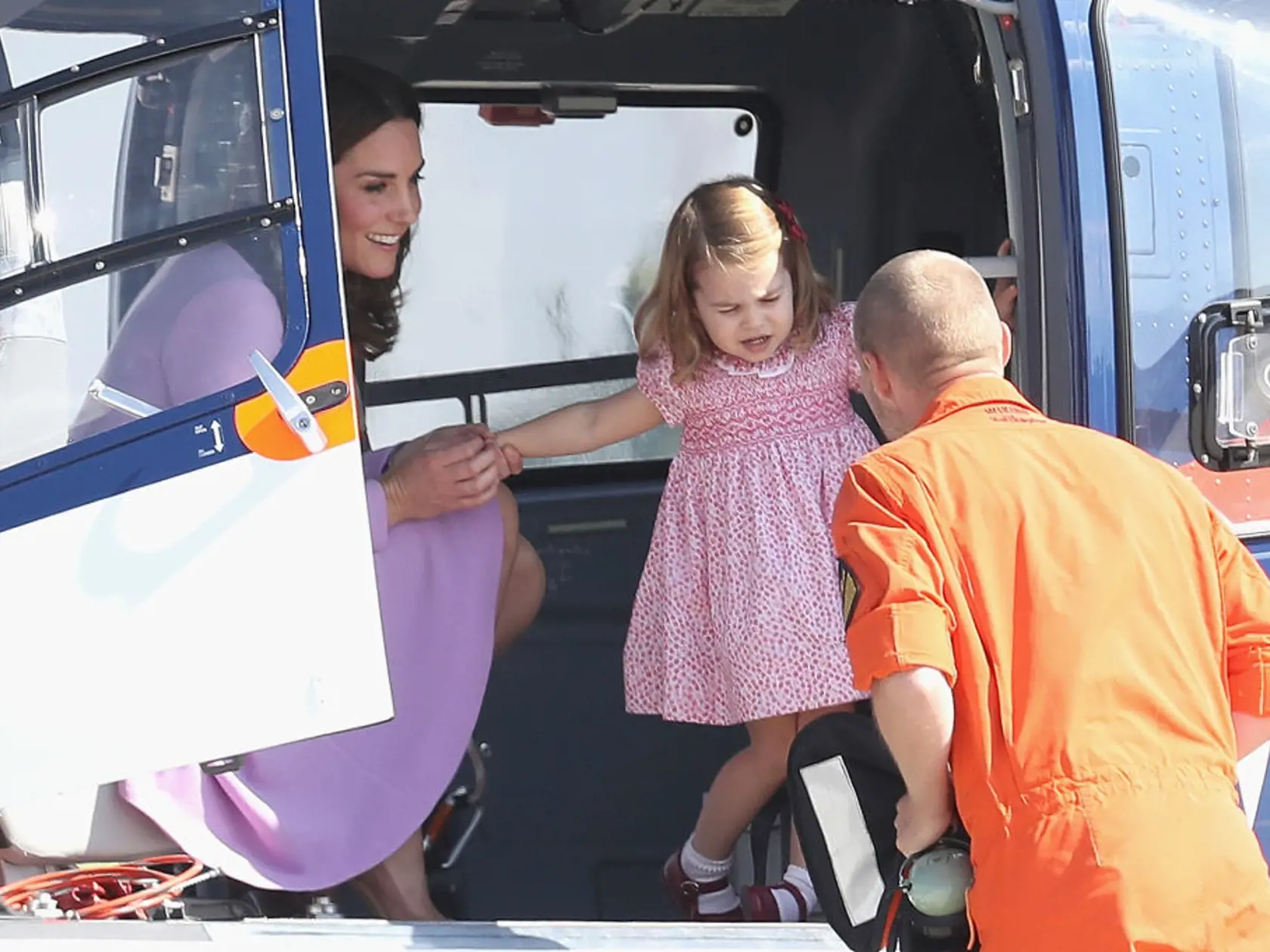 HAMBURG, GERMANY - JULY 21:  Prince William, Duke of Cambridge, Catherine, Duchess of Cambridge, Prince George of Cambridge and Princess Charlotte of Cambridge view helicopter models H145 and H135 before departing from Hamburg airport on the last day of their official visit to Poland and Germany on July 21, 2017 in Hamburg, Germany.  (Photo by Chris Jackson/Getty Images)