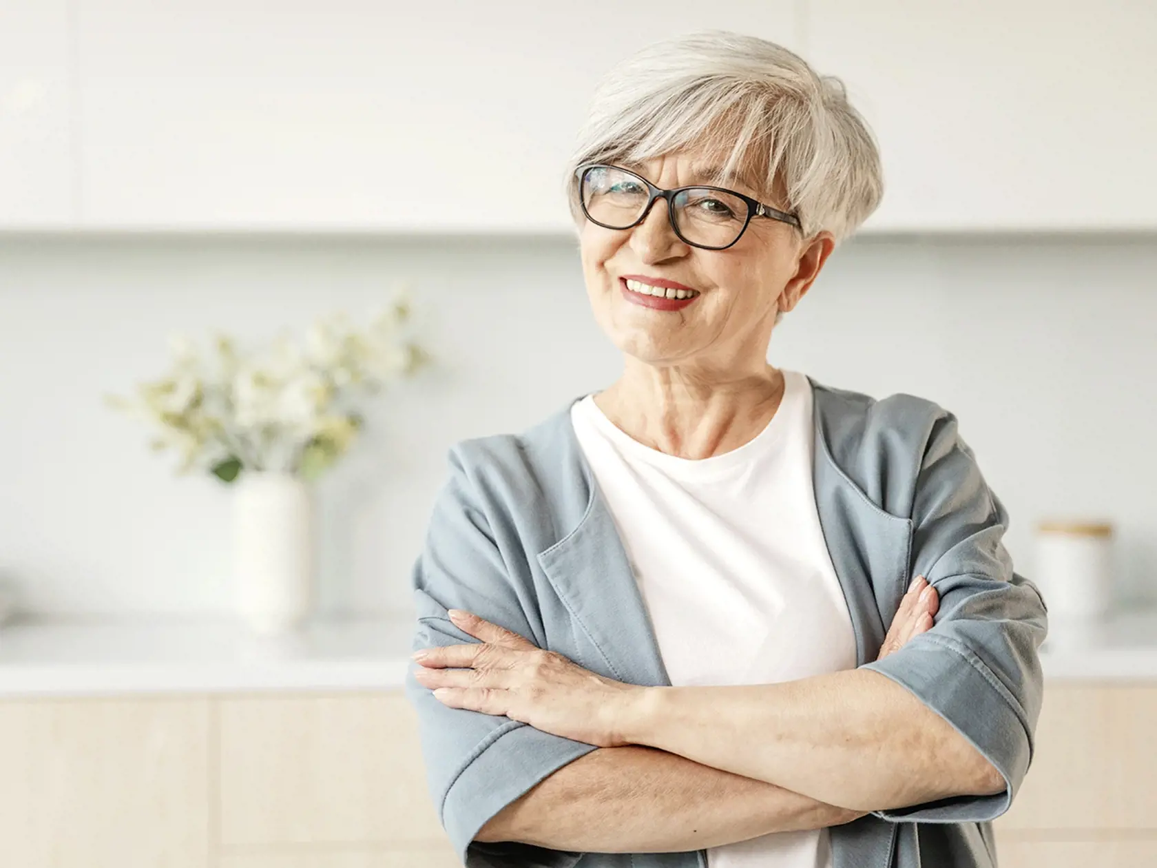 Portrait of confident stylish european middle aged senior woman. Older mature 60s lady smiling at home. Happy attractive senior female looking camera close up face headshot portrait. Happy people