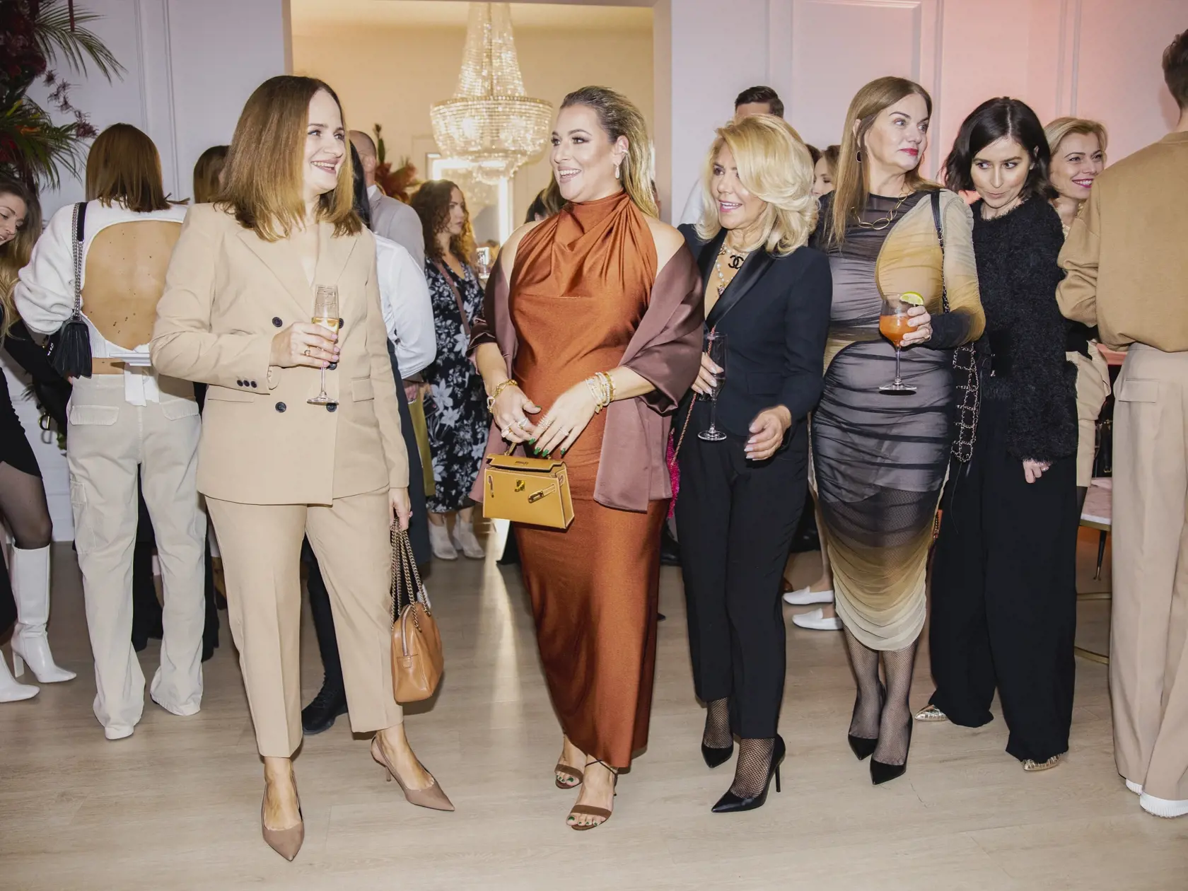 Na snímke Katarína Cibulková, Dominika Navara Cibulková, Monika Beňová a Zuzana Kubovčíková Šebová počas párty pri príležitosti piateho výročia založenia kliniky ENVY.