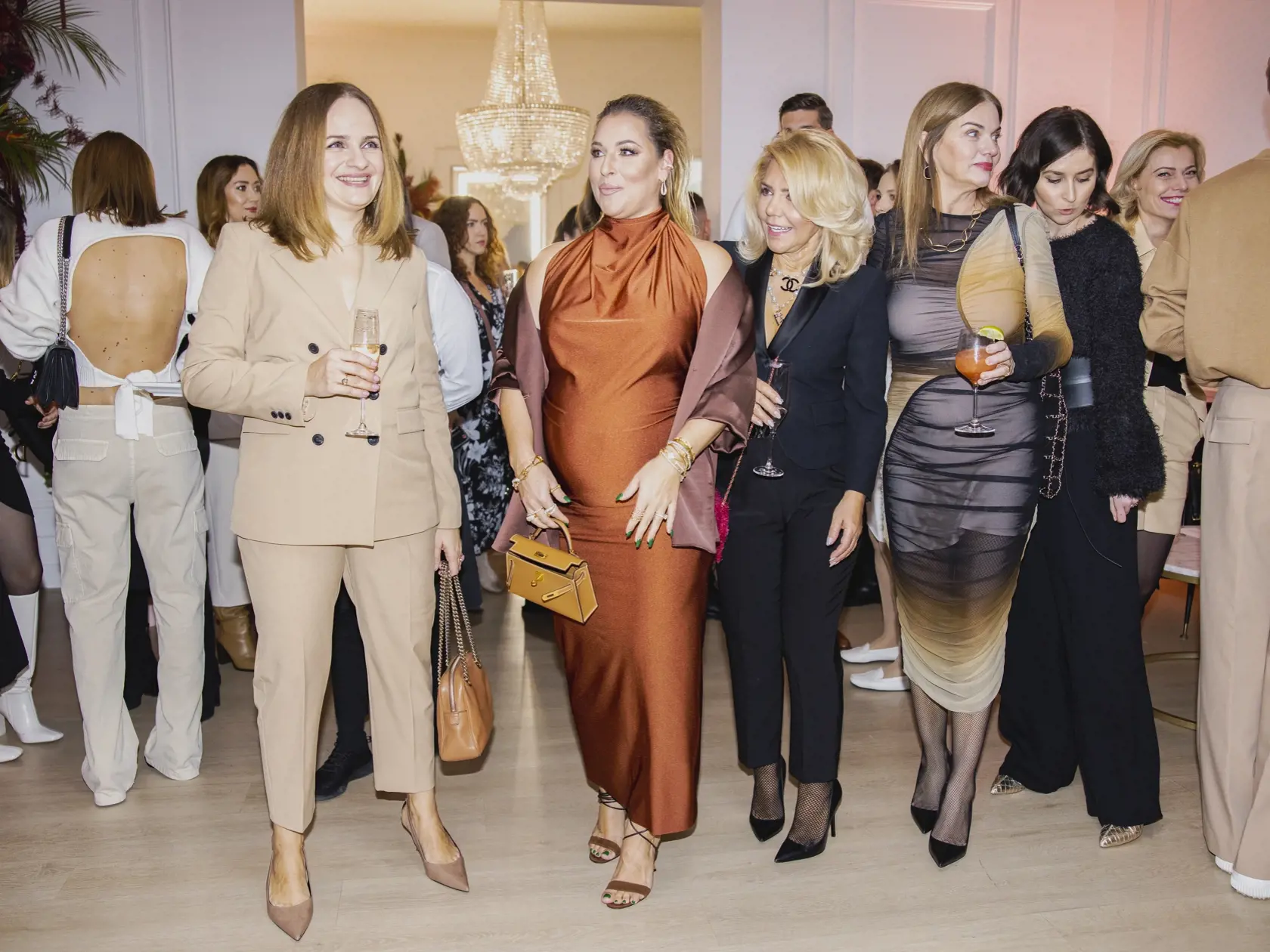 Na snímke Katarína Cibulková, Dominika Navara Cibulková, Monika Beňová a Zuzana Kubovčíková Šebová počas párty pri príležitosti piateho výročia založenia kliniky ENVY.