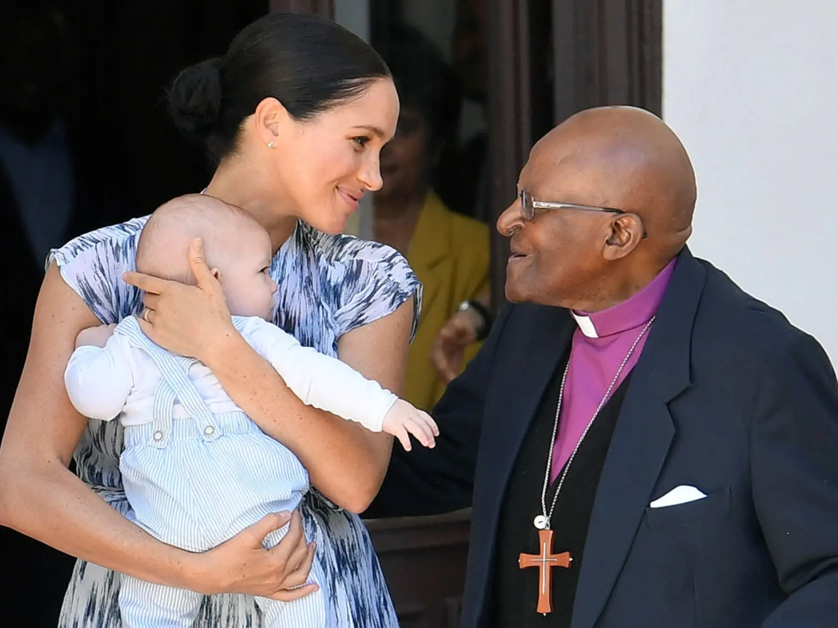 CAPE TOWN, SOUTH AFRICA - SEPTEMBER 25:  Meghan, Duchess of Sussex speaks to Archbishop Desmond Tutu while holding her baby son Archie Mountbatten-Windsor, during a visit to the Desmond & Leah Tutu Legacy Foundation during their royal tour of South Africa on September 25, 2019 in Cape Town, South Africa. (Photo by Toby Melville - Pool/Getty Images)