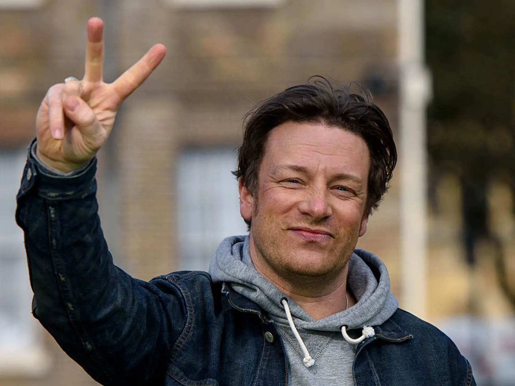 LONDON, ENGLAND - MARCH 16: Jamie Oliver poses as he is interviewed in Westminister after British Chancellor of the Exchequer, George Osborne reveals the 2016 budget statement on March 16, 2016 in London, England. Today's budget will set the expenditure of the public sector for the year beginning on April 1st 2016 against the revenues gathered by HM Treasury. (Photo by Ben Pruchnie/Getty Images)