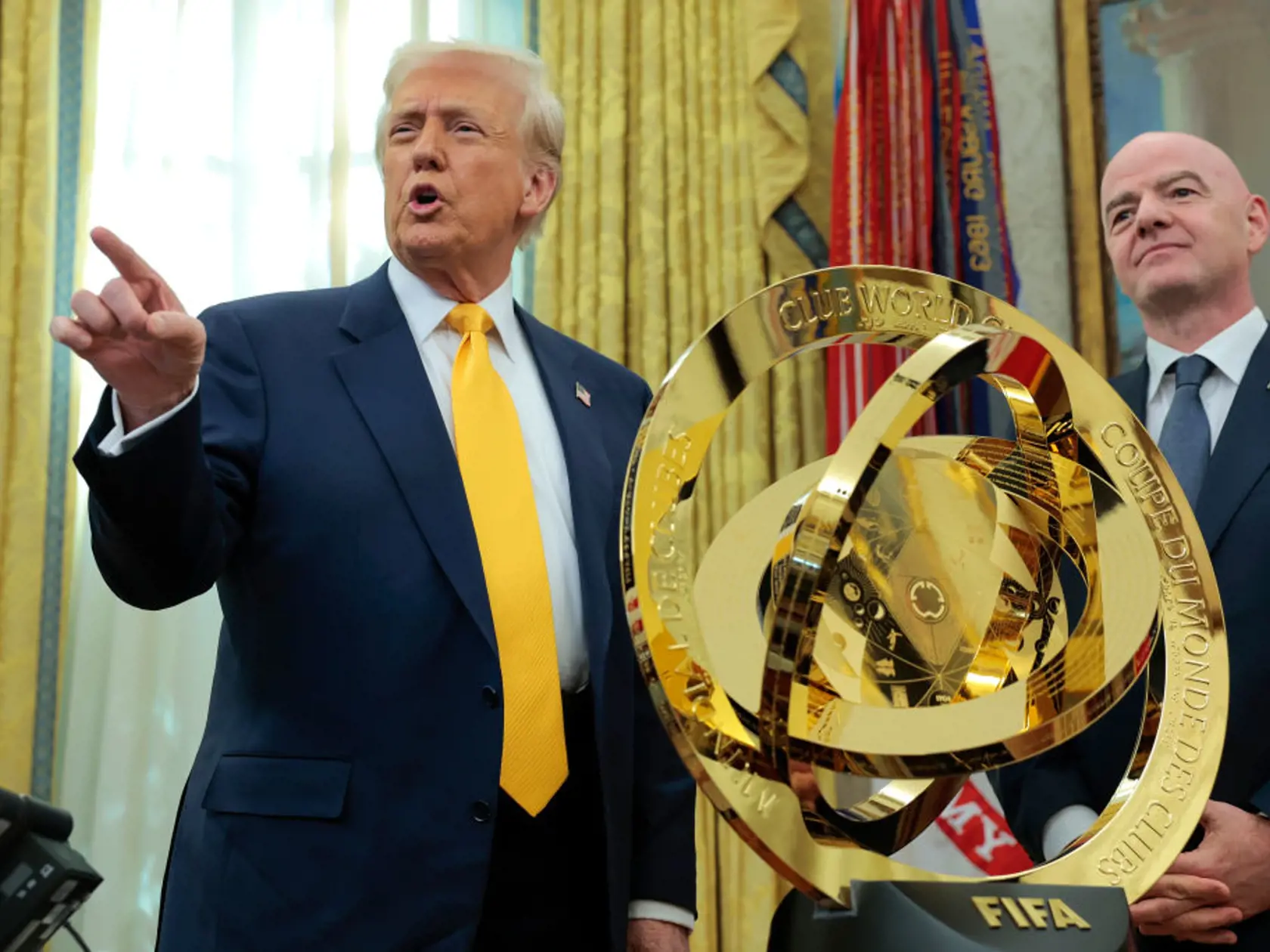 WASHINGTON, DC - MARCH 07: U.S. President Donald Trump speaks alongside President of Fédération Internationale de Football Association (FIFA) Gianni Infantino after unveiling the 2025 Club World Cup trophy in the Oval Office at the White House on March 07, 2025 in Washington, DC. President Trump signed an executive order establishing a White House Task Force for the 2026 World Cup.  (Photo by Anna Moneymaker/Getty Images)