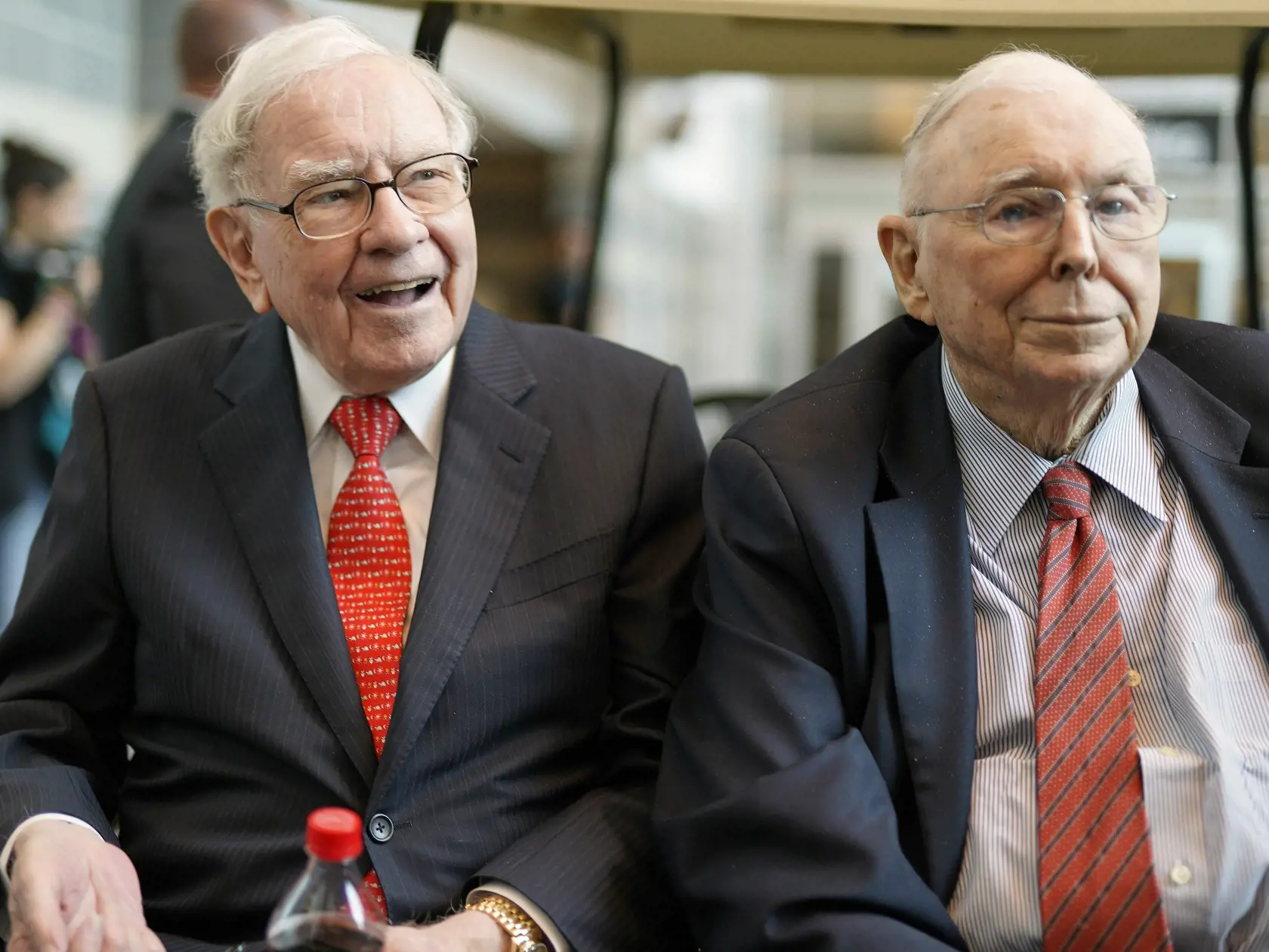 Berkshire Hathaway Chairman and CEO Warren Buffett, left, and Vice Chairman Charlie Munger, briefly chat with reporters Friday, May 3, 2019, one day before Berkshire Hathaway's annual shareholders meeting. An estimated 40,000 people are expected in town for the event, where Buffett and Munger preside over the meeting and spend hours answering questions. (AP Photo/Nati Harnik)
