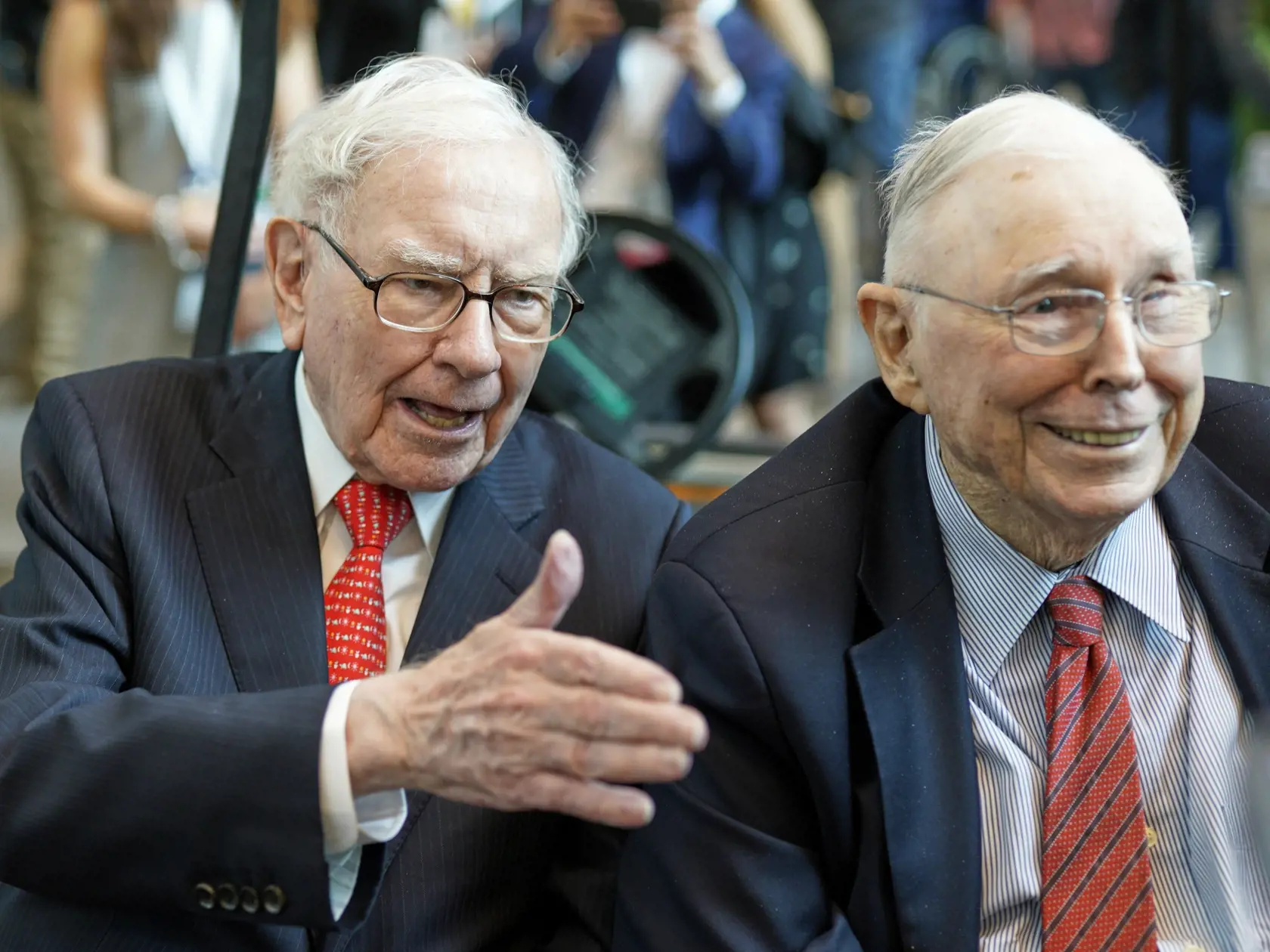 Berkshire Hathaway Chairman and CEO Warren Buffett, left, and Vice Chairman Charlie Munger, briefly chat with reporters Friday, May 3, 2019, one day before Berkshire Hathaway's annual shareholders meeting. An estimated 40,000 people are expected in town for the event, where Buffett and Munger preside over the meeting and spend hours answering questions. (AP Photo/Nati Harnik)