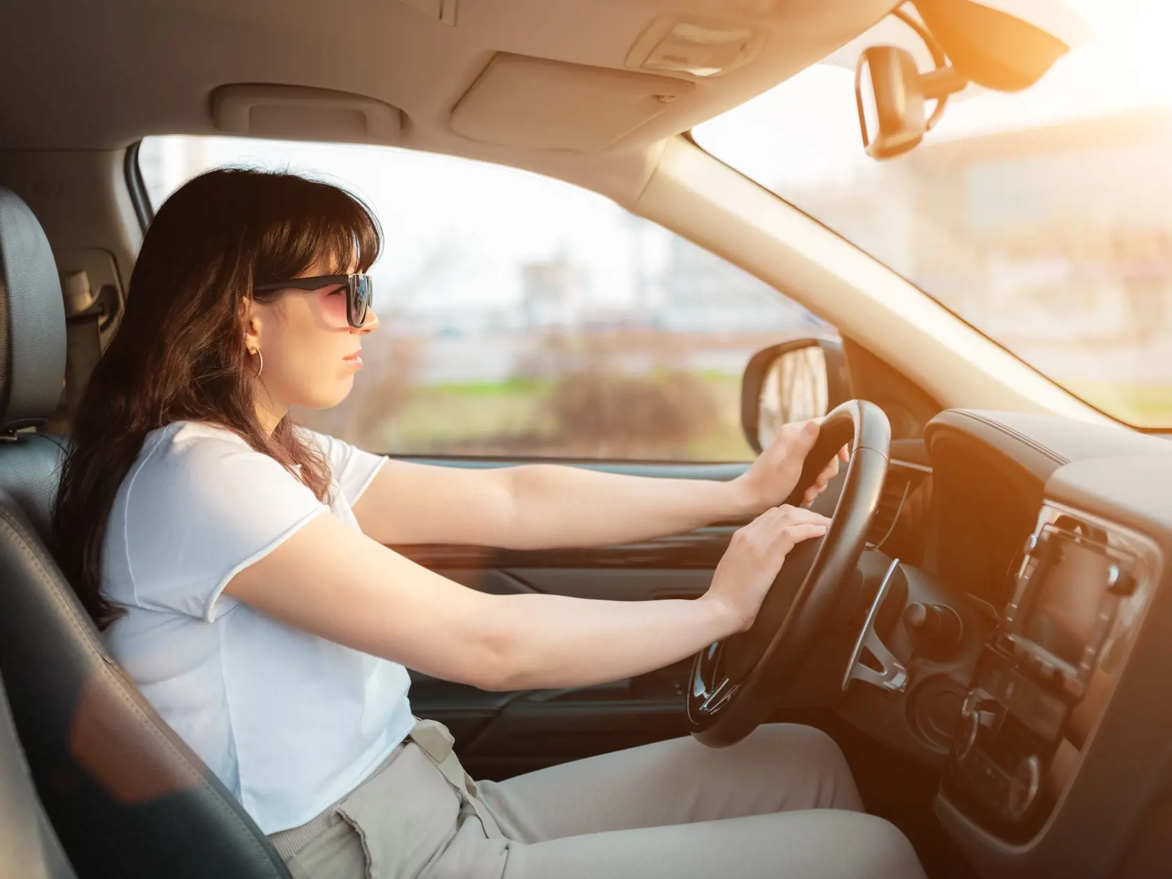 Plump,Woman,In,White,Tshirt,Without,Seatbelt,Driving,A,Car