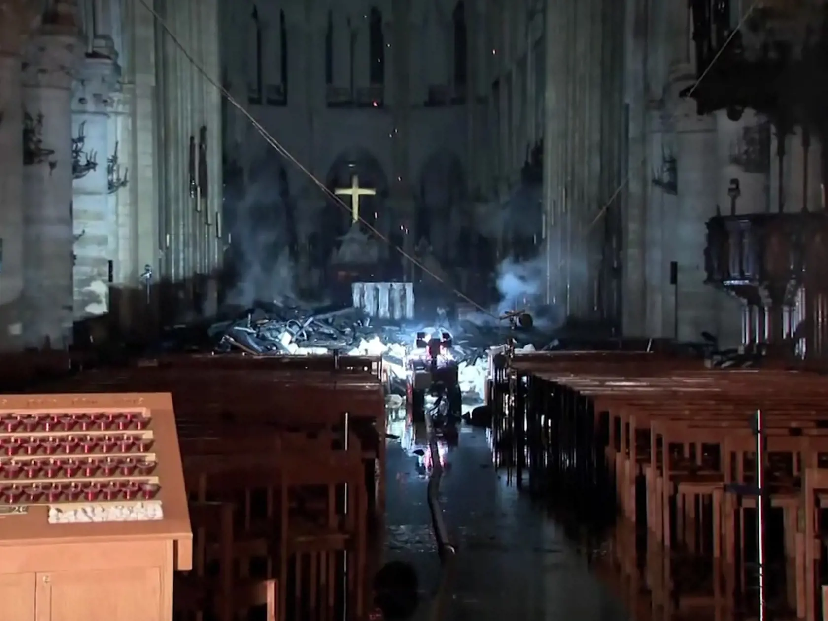 This image taken from France Televisions video shows the fire damage inside the Notre Dame cathedral in Paris, Monday April 15, 2019.  Firefighters declared success Tuesday morning in an over 12-hour battle to extinguish an inferno engulfing Paris' iconic Notre Dame cathedral that claimed its spire and roof, but spared its bell towers. (France Televisions via AP)