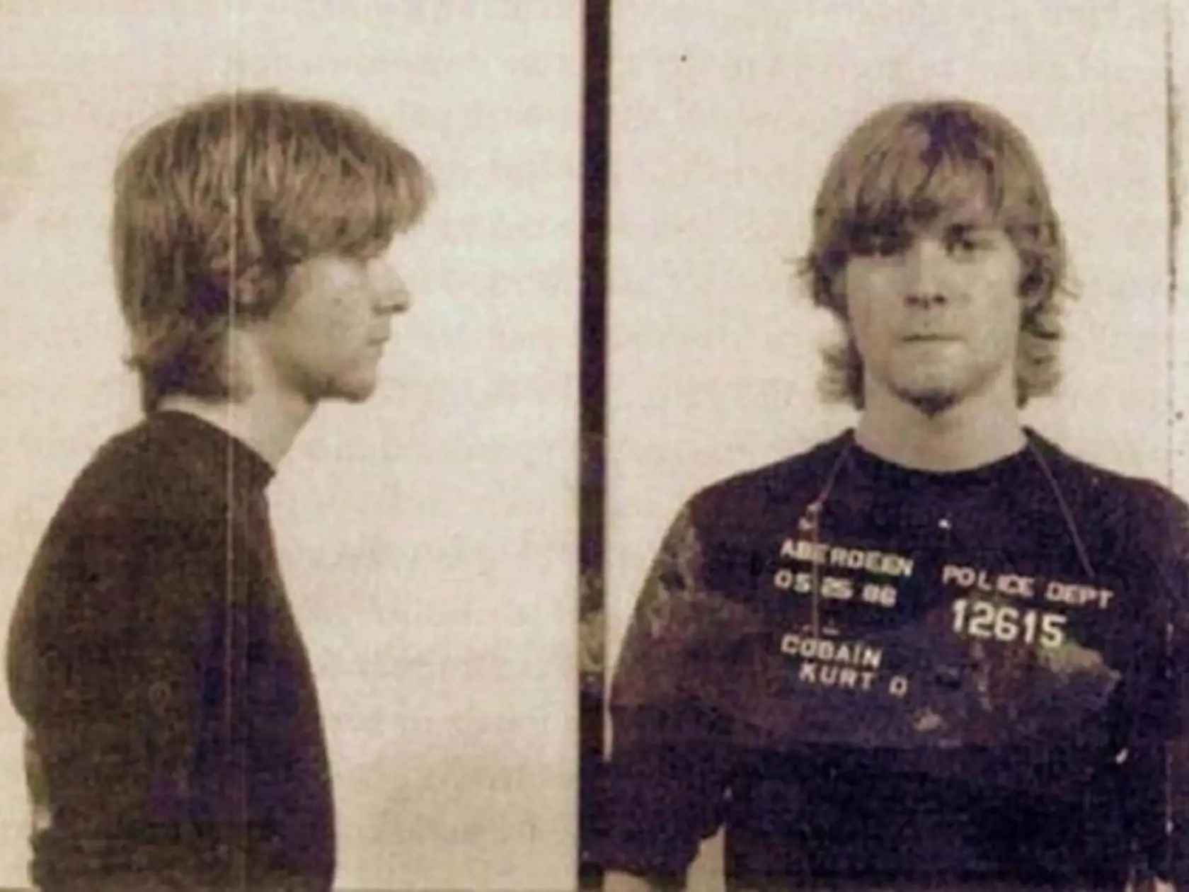 Kurt Cobain vo Washingtone 25. mája 1986. Zatkli ho potom, ako sa zdrogovaný vyšplhal na strechu opusteného skladiska.