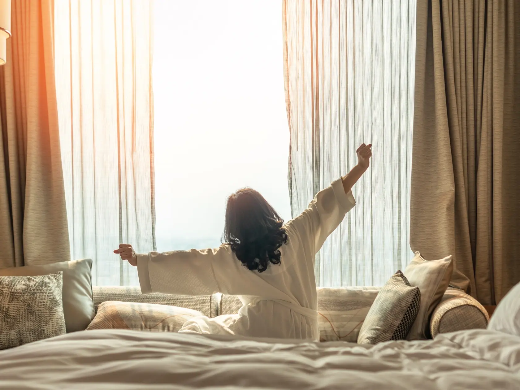 Hotel,Relaxation,On,Lazy,Day,With,Asian,Woman,Waking,Up