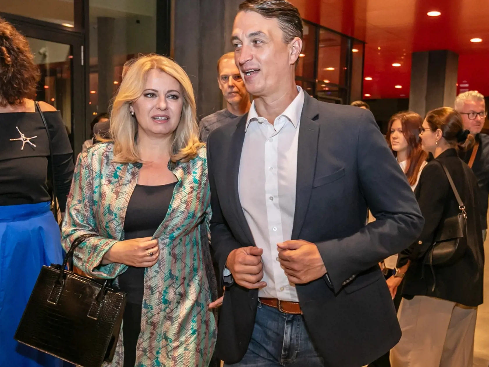 Na snímke prezidentka SR Zuzana Čaputová a Juraj Rizman prichádzajú na premiéru filmu Šťastný človek v SNG. 