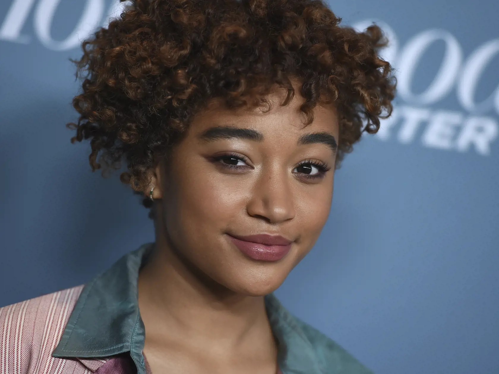 FILE- In this Dec. 5, 2018, file photo Amandla Stenberg arrives at The Hollywood Reporter's Women in Entertainment Breakfast at Milk Studios in Los Angeles. ESSENCE has named four actresses as its annual â€śBlack Women in Hollywoodâ€ť honorees. They are Regina Hall, Stenberg, Kiki Layne and Jenifer Lewis. The awards luncheon will be held Feb. 21 in Beverly Hills, Calif. (Photo by Jordan Strauss/Invision/AP, File)