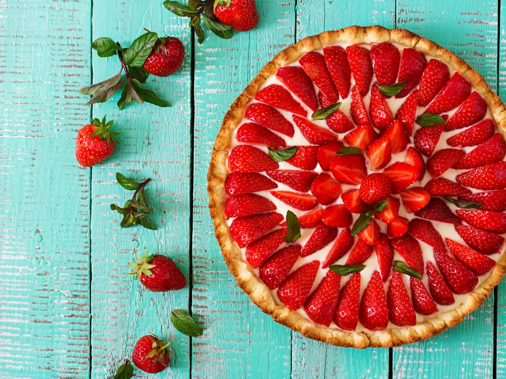 Tart,With,Strawberries,And,Whipped,Cream,Decorated,With,Mint,Leaves.
