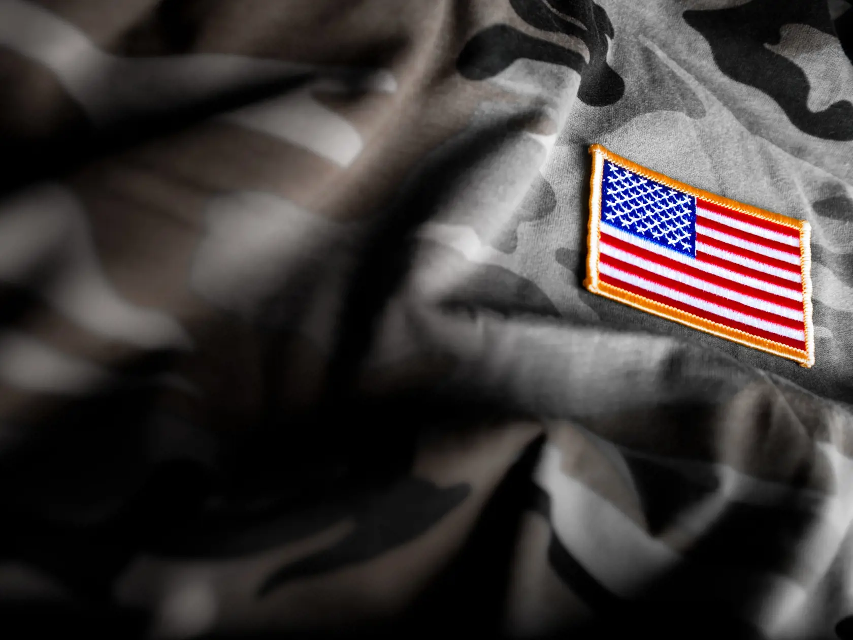 American flag patch on camoflage