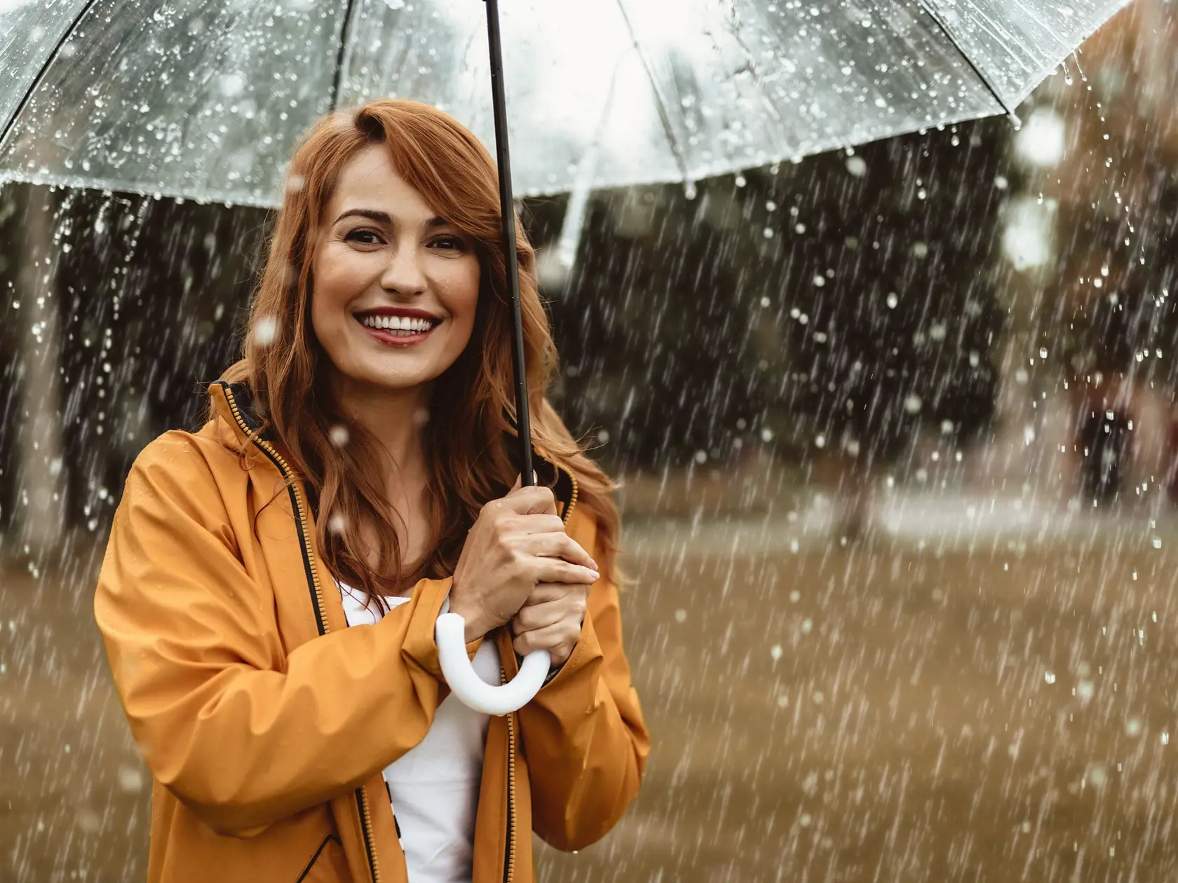 Waist,Up,Portrait,Of,Laughing,Pretty,Woman,Holding,Umbrella,Outdoors.