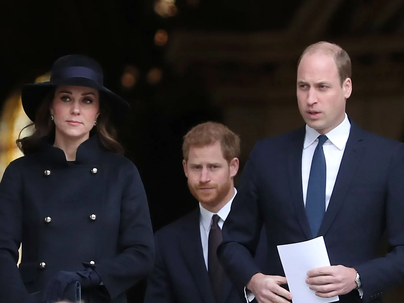LONDON, ENGLAND - DECEMBER 14:  Catherine, Duchess of Cambridge,  Prince William, Duke of Cambridge and Prince Harry leave after attending the Grenfell Tower National Memorial Service at St Paul's Cathedral on December 14, 2017 in London, England. The Royal Family and Prime Minister will join survivors of the Grenfell Tower fire at the memorial at St Paul's Cathedral for the six-month anniversary which killed 71 people. About 1,500 people are expected to attend  the multi-faith service. (Photo b