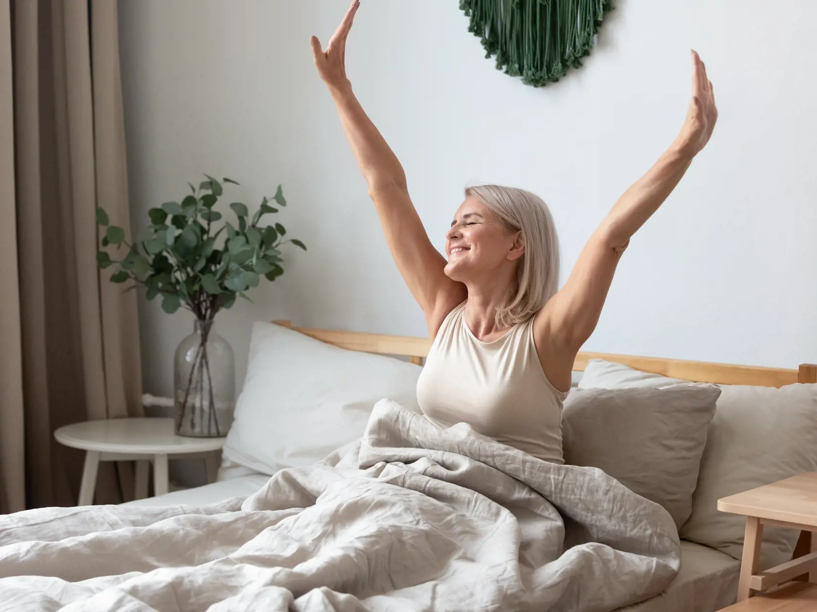 Happy,Fresh,Mature,Middle,Aged,Woman,Stretching,In,Bed,Waking