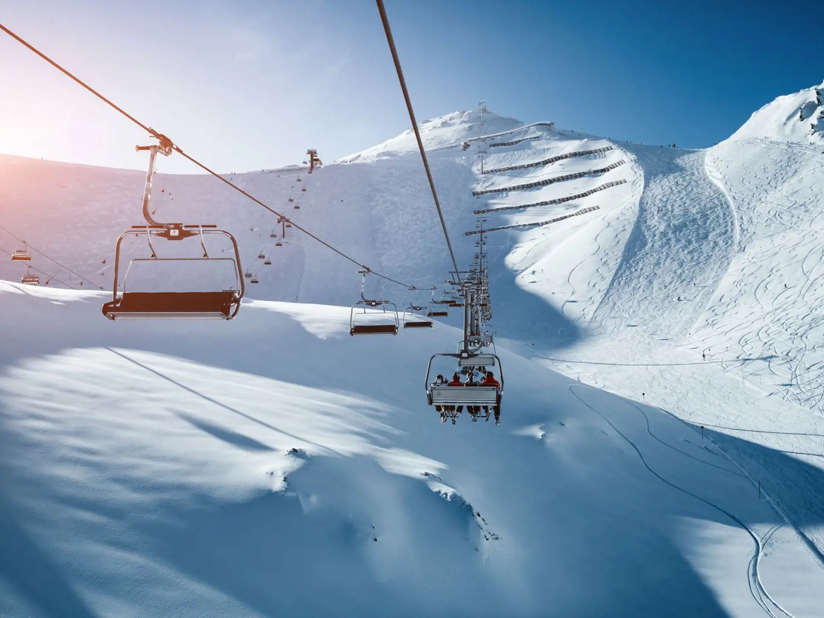 Attractive view on skiing area on a frosty day. Location place Paznaun valley, ski resort Silvretta Arena Ischgl