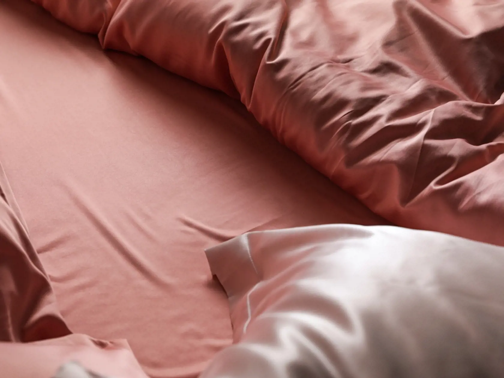 Closeup,View,Of,Bed,With,Beautiful,Silk,Linens