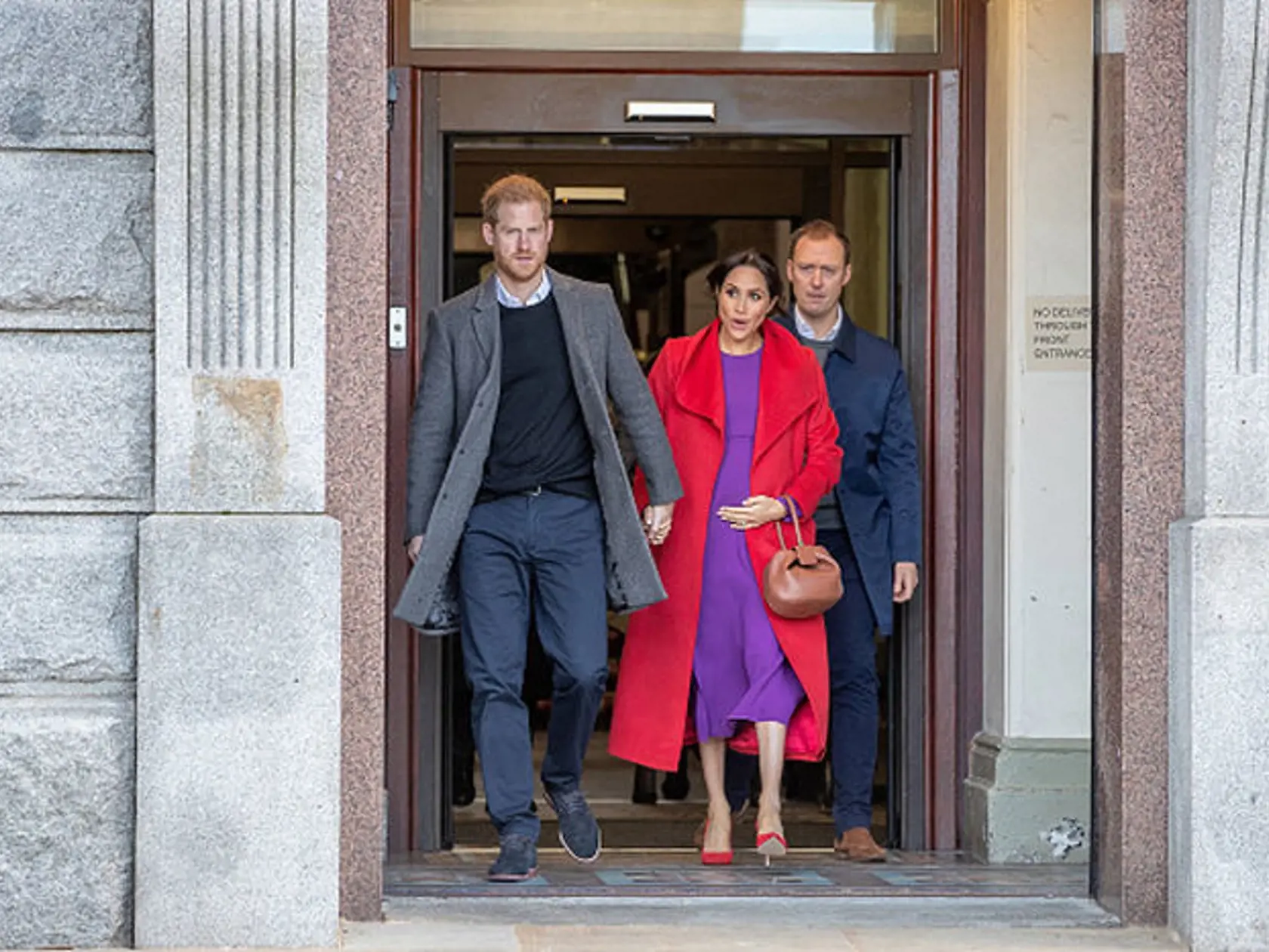 BIRKENHEAD, UNITED KINGDOM - JANUARY 14: Prince Harry, Duke of Sussex and Meghan, Duchess of Sussex visit a new statue to mark the 100th anniversary of the death of poet Wilfred Owen, which was erected on Hamilton Square in November, during an official visit to Birkenhead on January 14, 2019 in Birkenhead, United Kingdom. (Photo by Charlotte Graham - WPA Pool/Getty Images)
