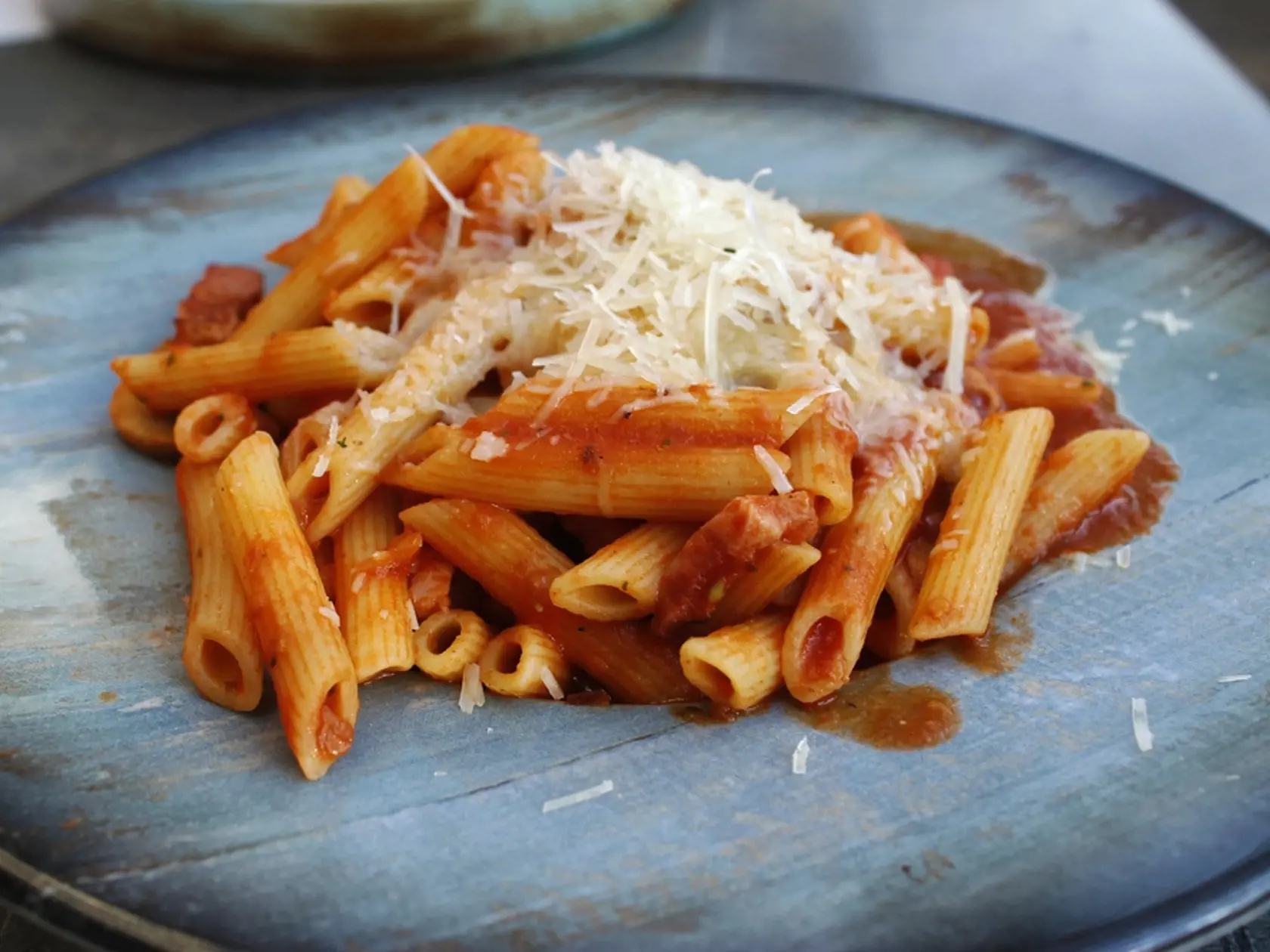 Beautiful,Plate,With,Delicious,Pastas,With,Melting,Parmezan,Cheese,On