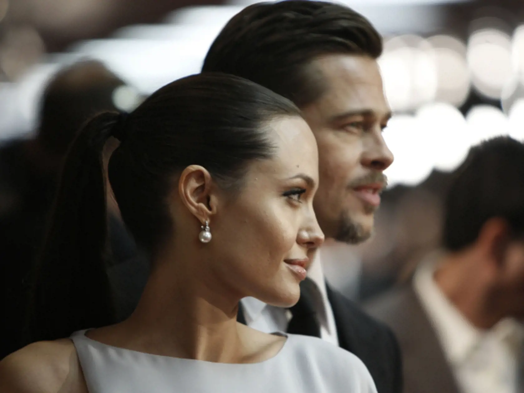 Angelina Jolie, left, and Brad Pitt arrive at the 14th Annual Critics' Choice Awards on Thursday Jan. 8, 2009 in Santa Monica, Calif. (AP Photo/Matt Sayles)