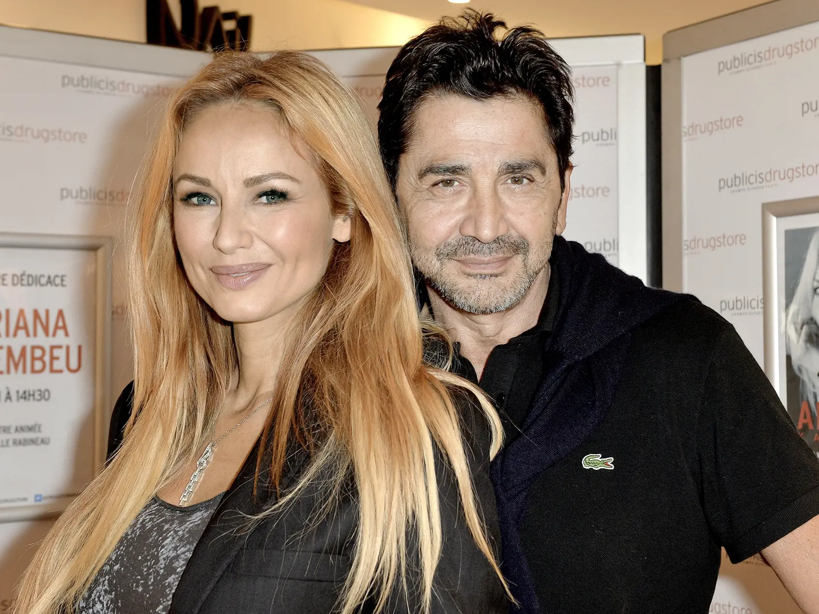 Adriana Karembeu et son mari André (Aram) Ohanian lors de la dédicace de son livre "Je viens d'un pays qui n'existe plus" ŕ la librairie du Publicis Drugstore ŕ Paris, le 25 septembre 2014. Adriana Karembeu and her husband Andre (Aram) Ohanian as she dedicates her book at the bookshop of Publicis Drugstore in Paris on September 25, 2014.,Image: 206502866, License: Rights-managed, Restrictions: , Model Release: no, Credit line: Profimedia