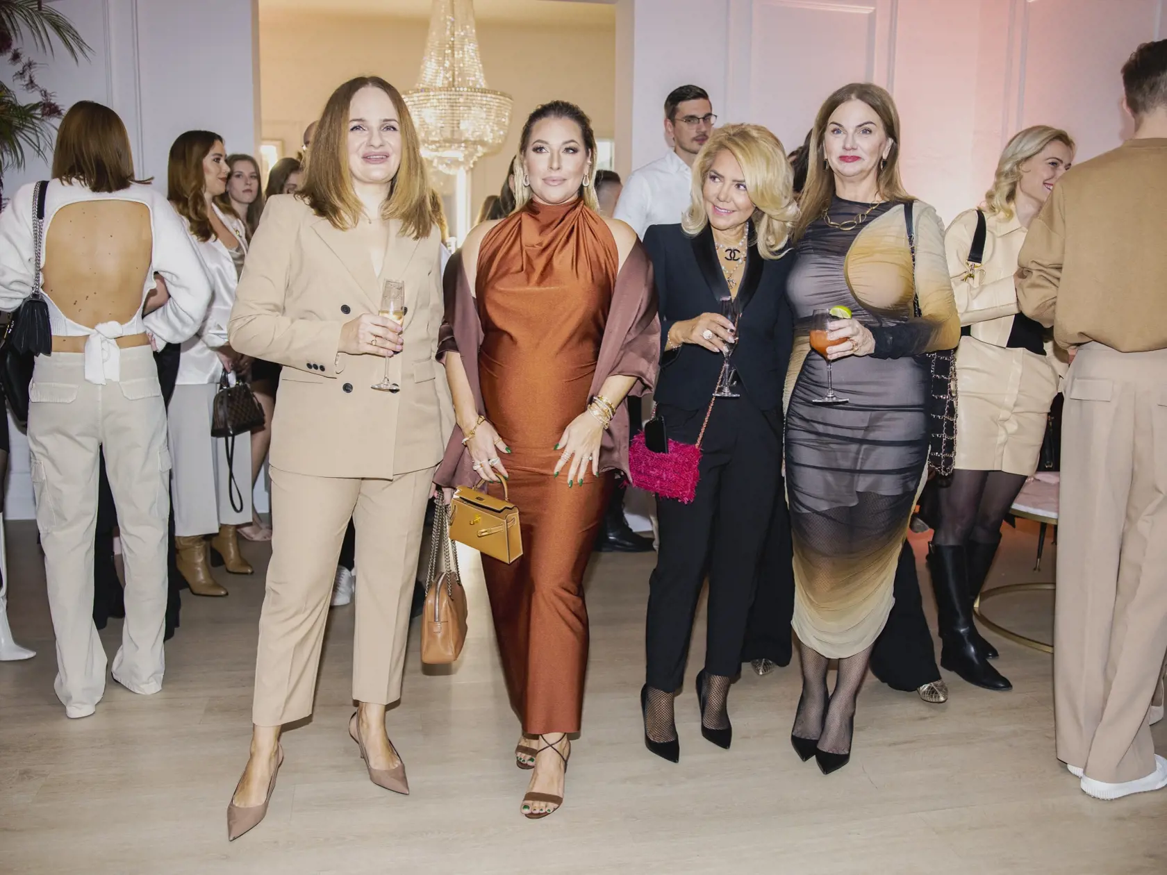 Na snímke Katarína Cibulková, Dominika Navara Cibulková, Monika Beňová a Zuzana Kubovčíková Šebová počas párty pri príležitosti piateho výročia založenia kliniky ENVY.