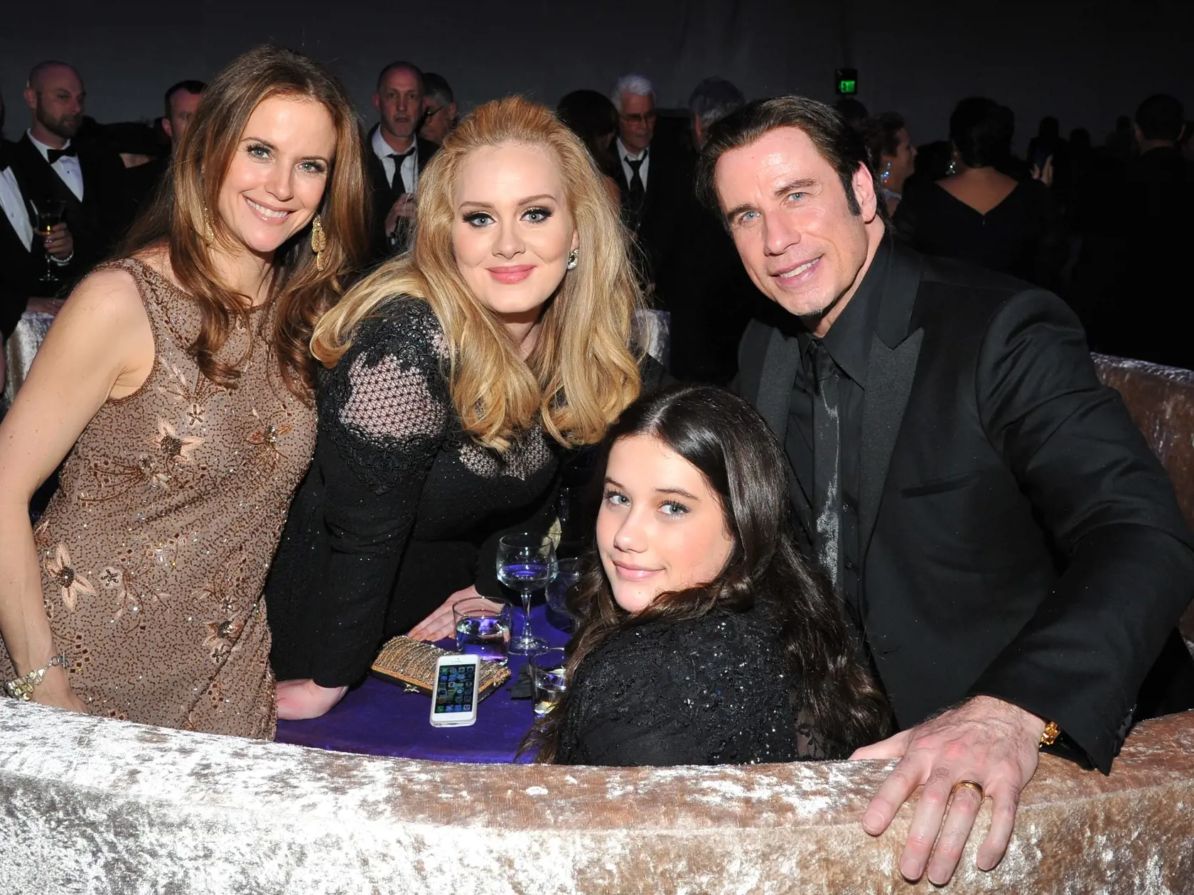 Kelly Preston, from left, singer Adele, Ella Bleu Travolta, and John Travolta attend the Governor's Ball following the Oscars at the Dolby Theatre on Sunday Feb. 24, 2013, in Los Angeles. (Photo by Vince Bucci/Invision/AP)