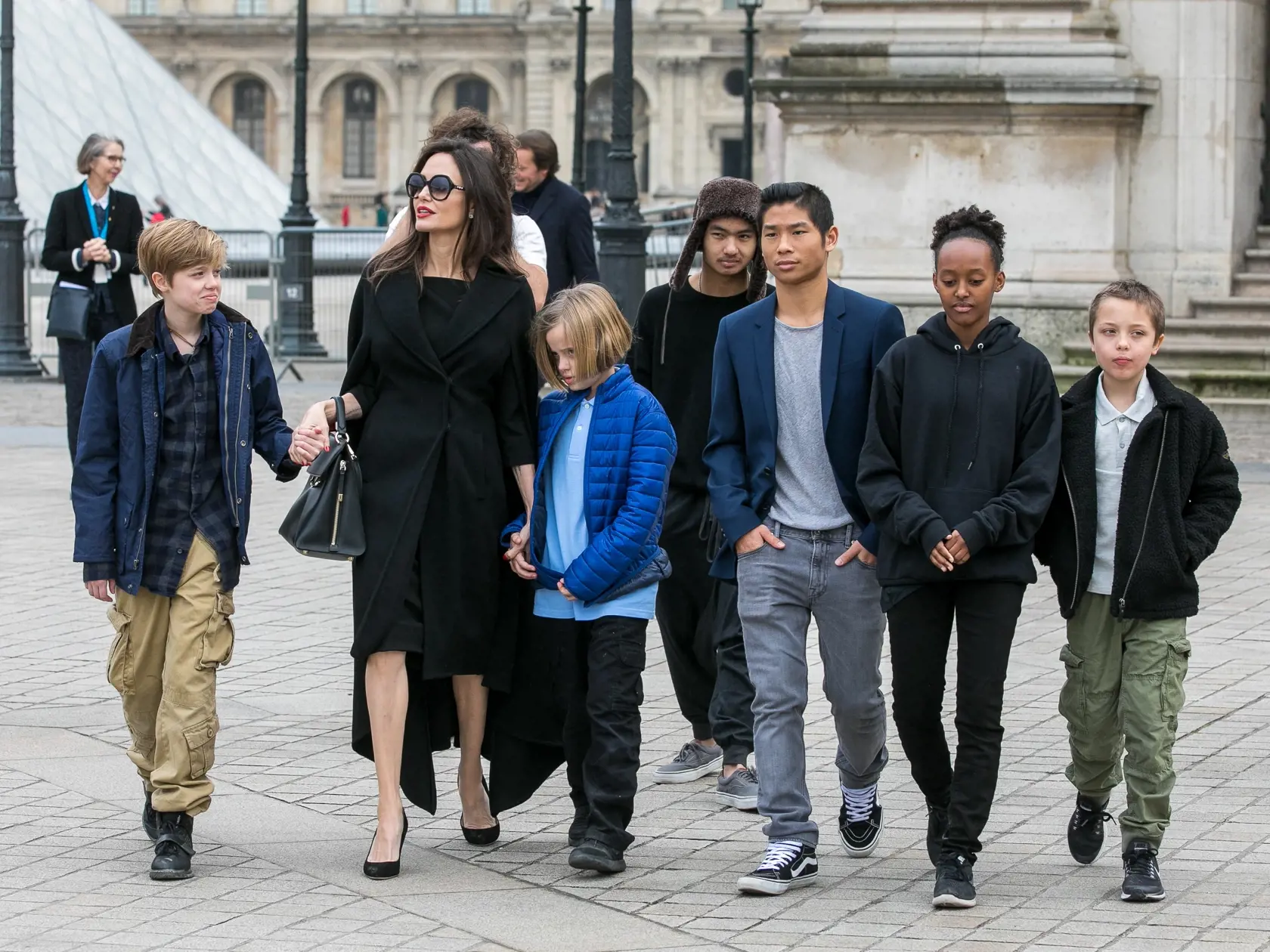 PARIS, FRANCE - JANUARY 30:  Actress Angelina Jolie and her children Maddox Jolie-Pitt, Shiloh Jolie-Pitt, Vivienne Marcheline Jolie-Pitt, Knox Leon Jolie-Pitt, Zahara Jolie-Pitt and Pax Jolie-Pitt are seen leaving the Louvre museum on January 30, 2018 in Paris, France.  (Photo by Marc Piasecki/GC Images)