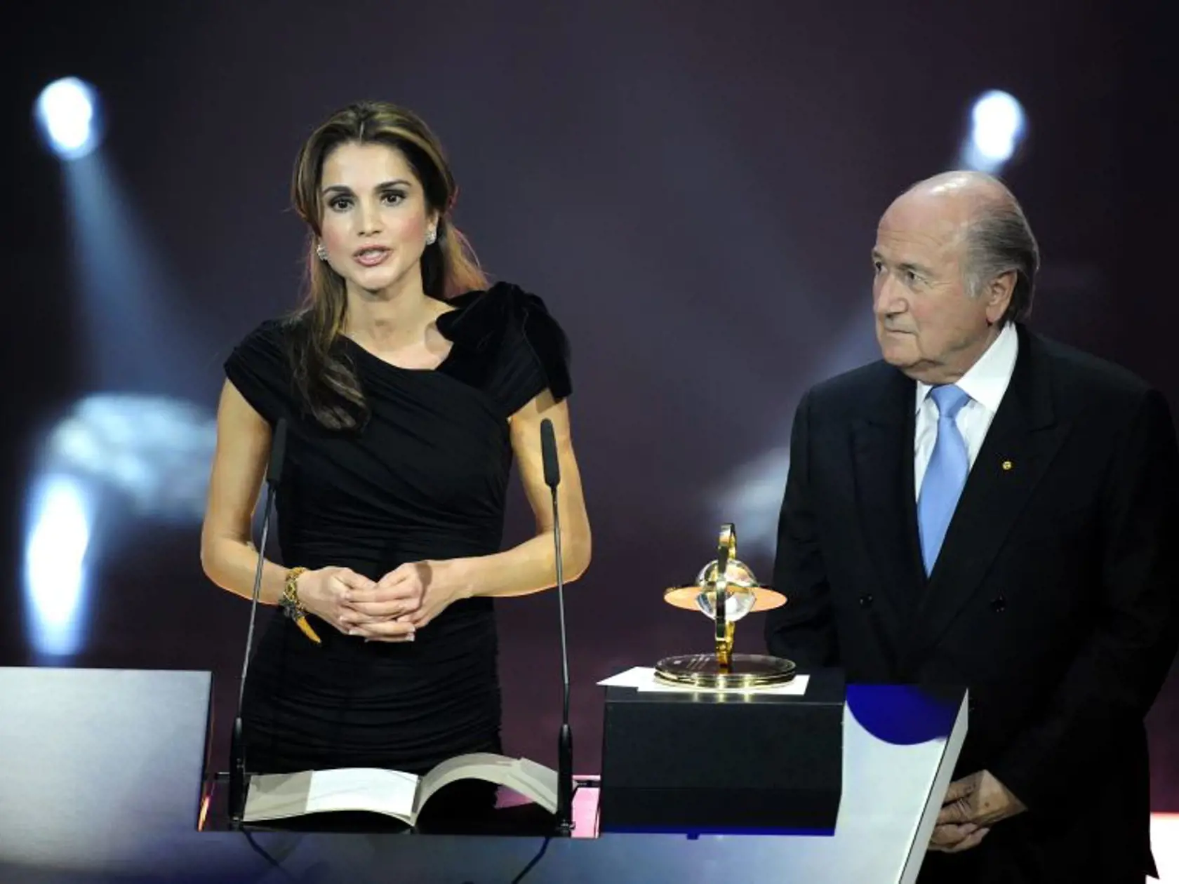 Queen Rania of Jordan, delivers a speech after receiving the Presidential Award for her work as president of the FIFA project "One Goal" as FIFA President Joseph S. Blatter, right, listens during the FIFA World Player Gala 2009 at the Kongresshaus in Zurich, Switzerland, Monday, Dec 21, 2009. (AP Photo/Keystone, Walter Bieri)