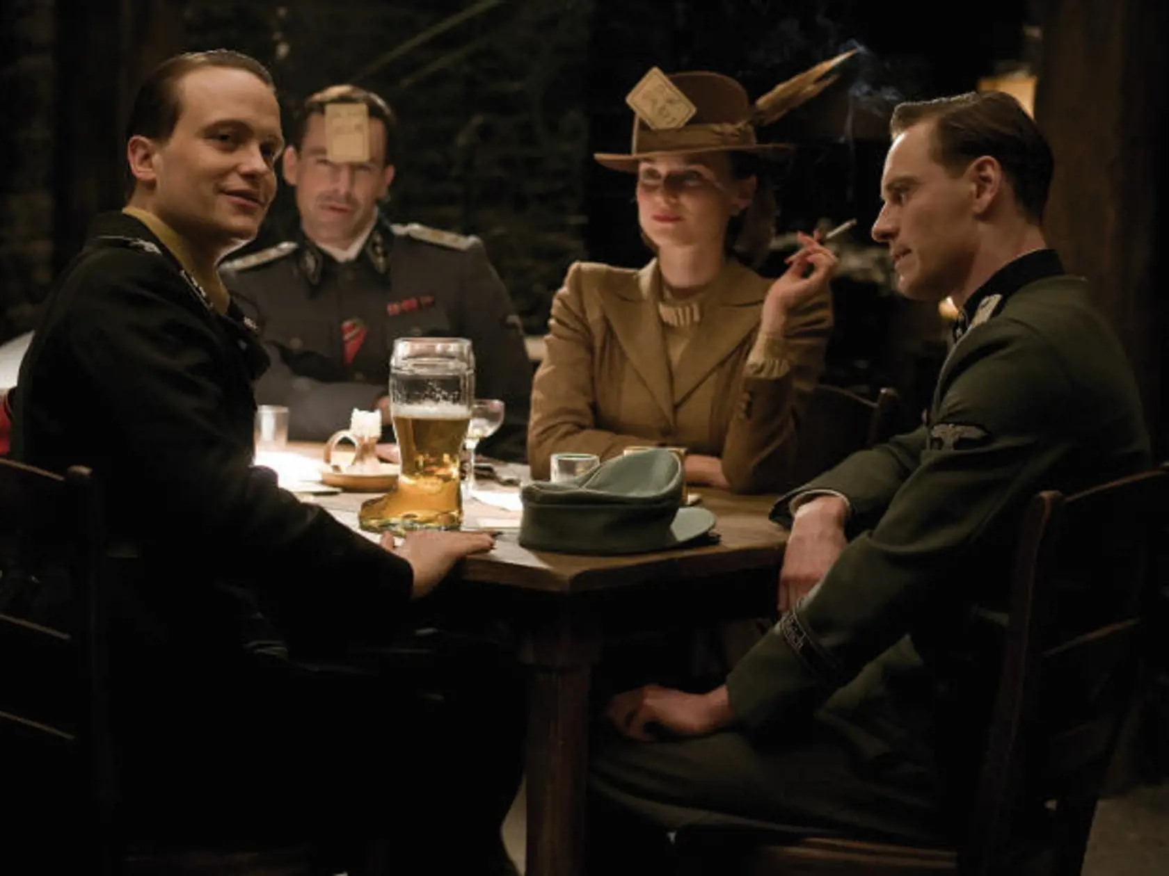 August Diehl (Major Dieter Hellstrom), Gedeon Burkhard (Cpl. Wilhelm Wick), Diane Kruger (Bridget Von Hammersmark) and Michael Fassbender (Lt. Archie Hicox) in INGLOURIOUS BASTERDS.