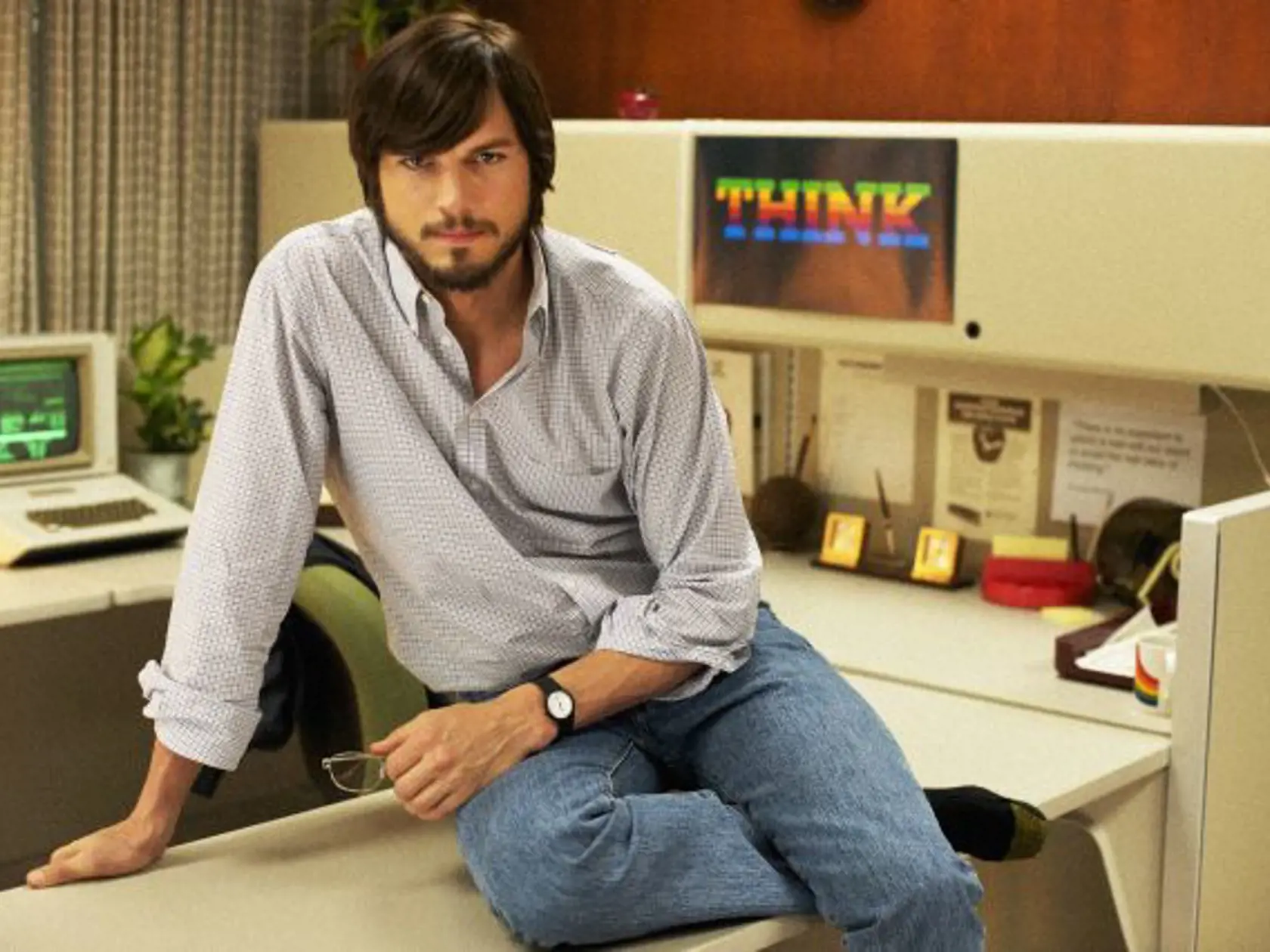 This undated publicity photo released by the Sundance Institute shows Ashton Kutcher as Steve Jobs in the film, "jOBS," directed by Joshua Michael Stern. The Sundance Film Festival begins Thursday, Jan. 17, 2013, in Park City, Utah. This year's lineup of 119 feature films includes, Ashton Kutcher as Apple co-founder Steve Jobs in director Joshua Michael Stern's film biography “jOBS”; Amanda Seyfried as porn star Linda Lovelace in Rob Epstein and Jeffrey Friedman's “Lovelace”; Daniel Radcliffe as