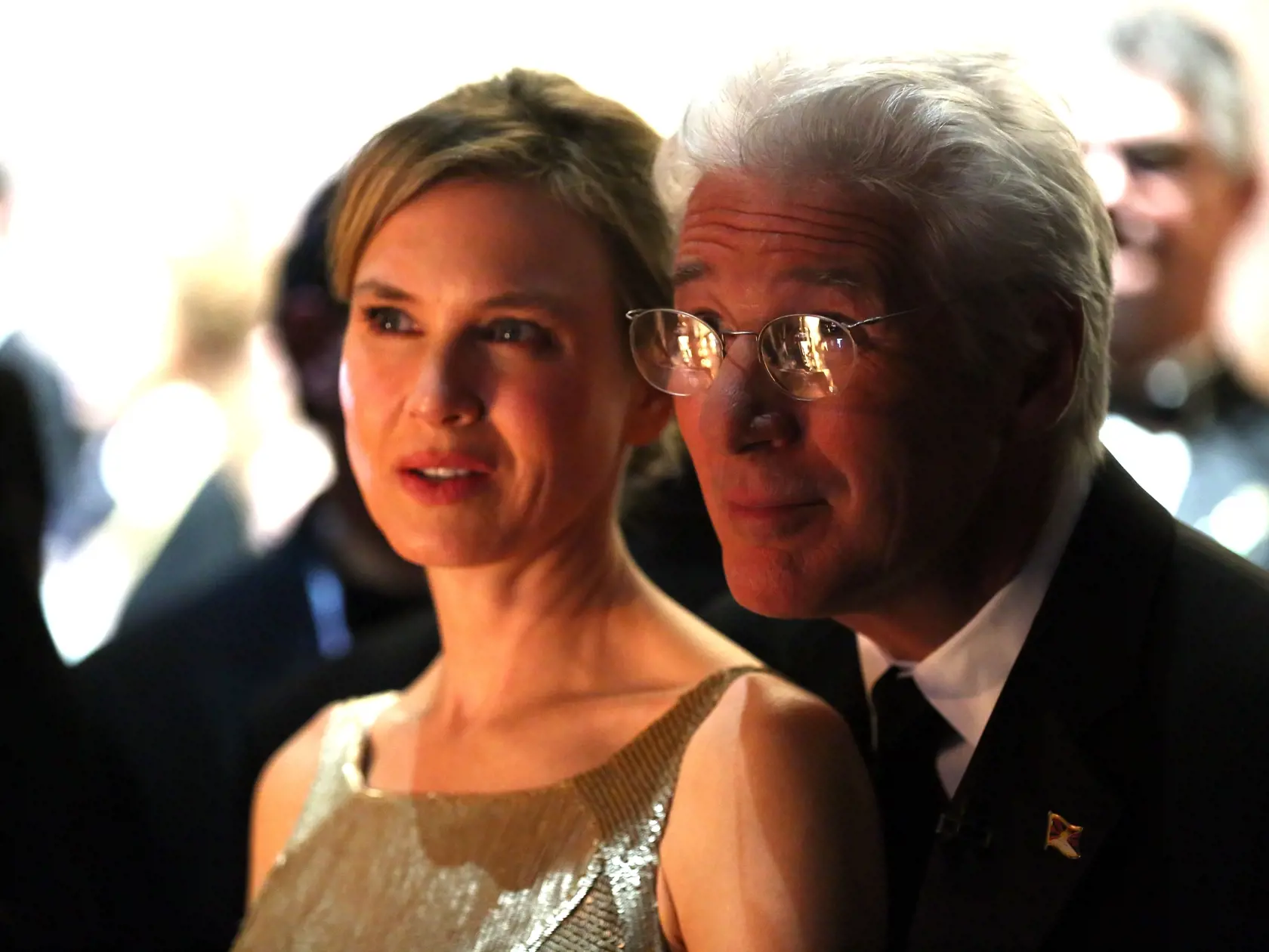 Renee Zellweger, left, and Richard Gere backstage at the Oscars at the Dolby Theatre on Sunday Feb. 24, 2013, in Los Angeles. (Photo by Matt Sayles/Invision/AP)