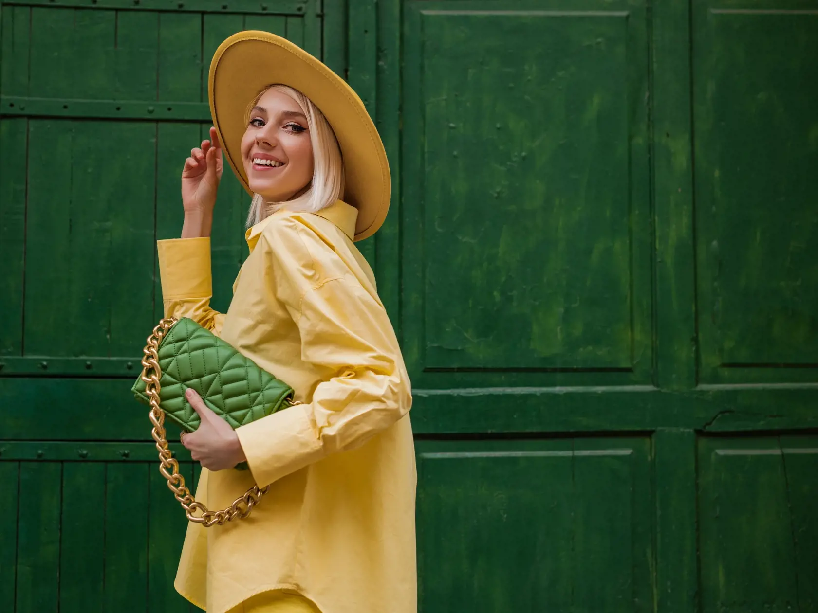 Joyful,Smiling,Woman,Wearing,Yellow,Hat,,Classic,Shirt,,Holding,Quilted