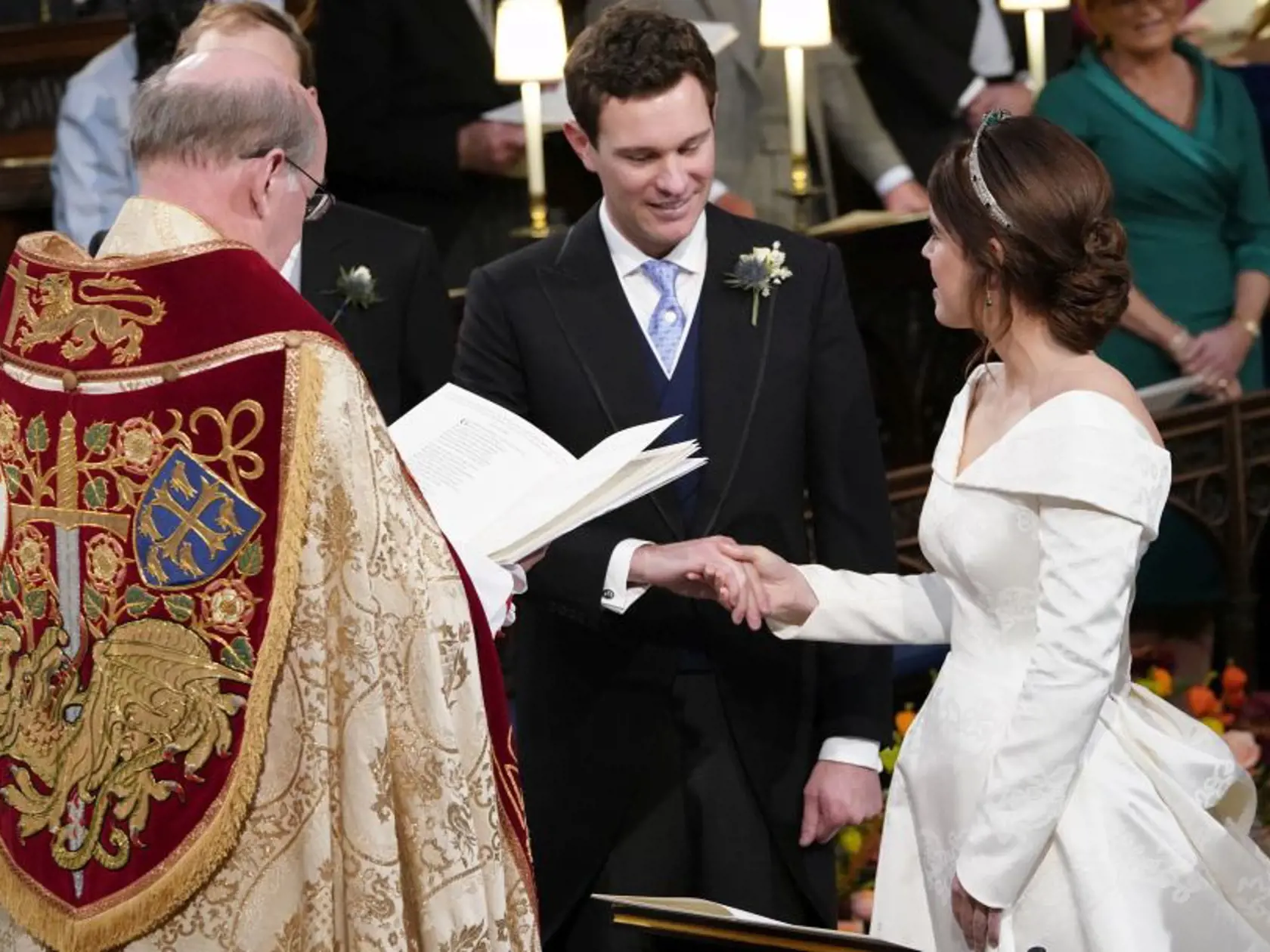 Britain's Princess Eugenie and Jack Brooksbank during their wedding ceremony in St Georgeâs Chapel, Windsor Castle, near London, England, Friday Oct. 12, 2018. (Danny Lawson/Pool via AP)