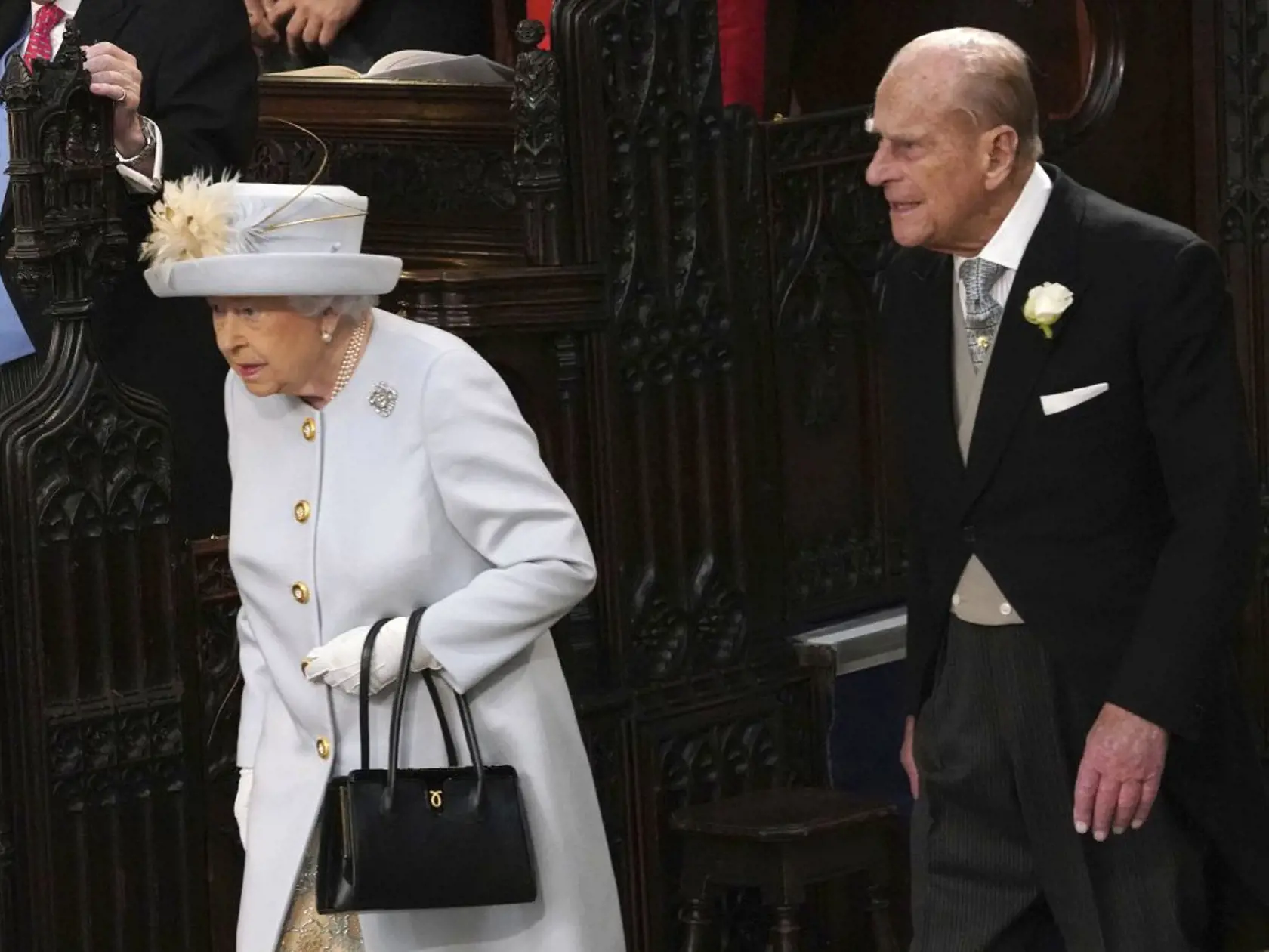 Queen Elizabeth II and Prince Philip arrive for the wedding of Princess Eugenie of York and Jack Brooksbank in St Georgeâs Chapel, Windsor Castle, near London, England, Friday Oct. 12, 2018. (Jonathan Brady, Pool via AP)