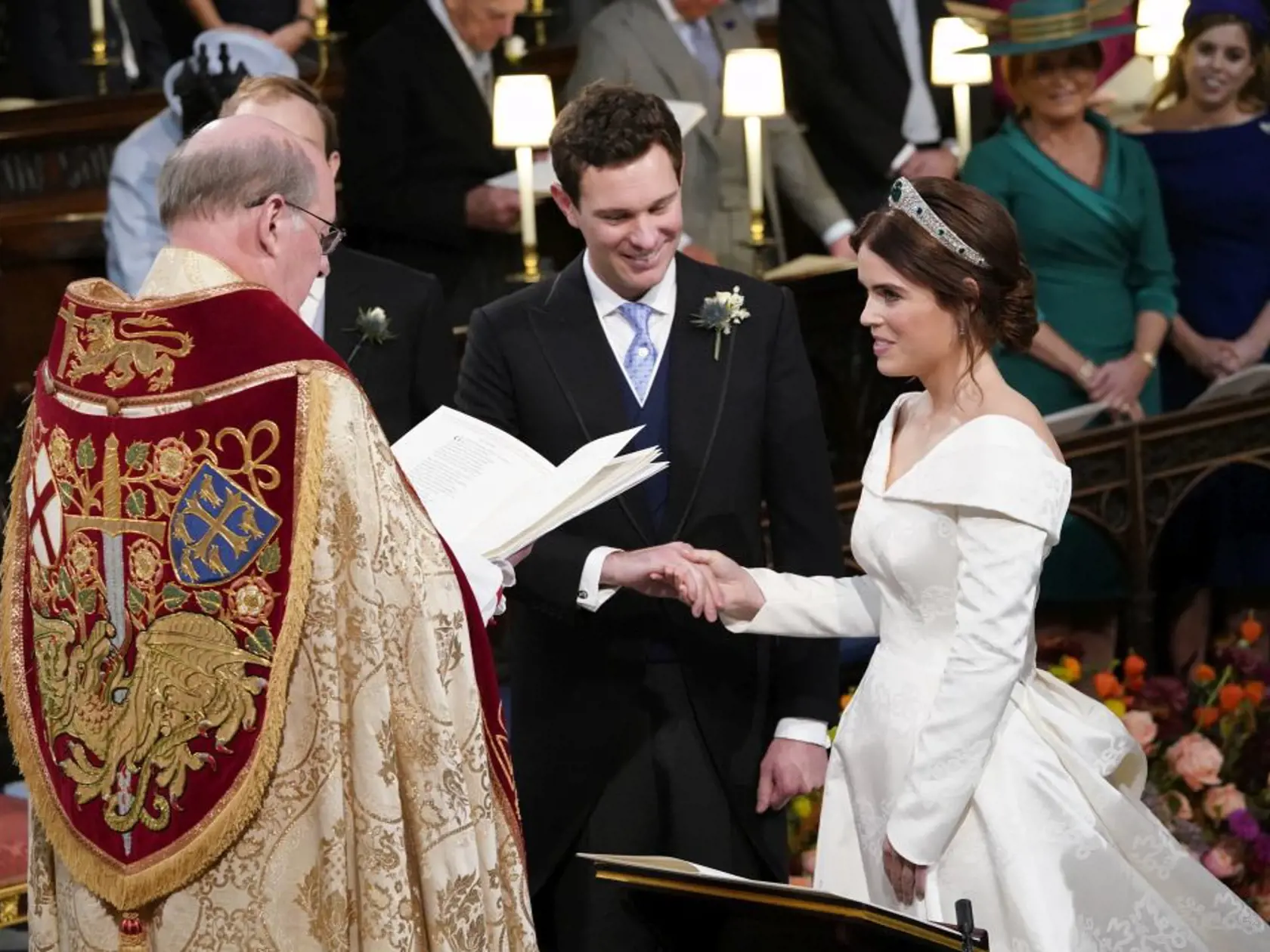 Britain's Princess Eugenie and Jack Brooksbank during their wedding ceremony in St Georgeâs Chapel, Windsor Castle, near London, England, Friday Oct. 12, 2018. (Danny Lawson/Pool via AP)