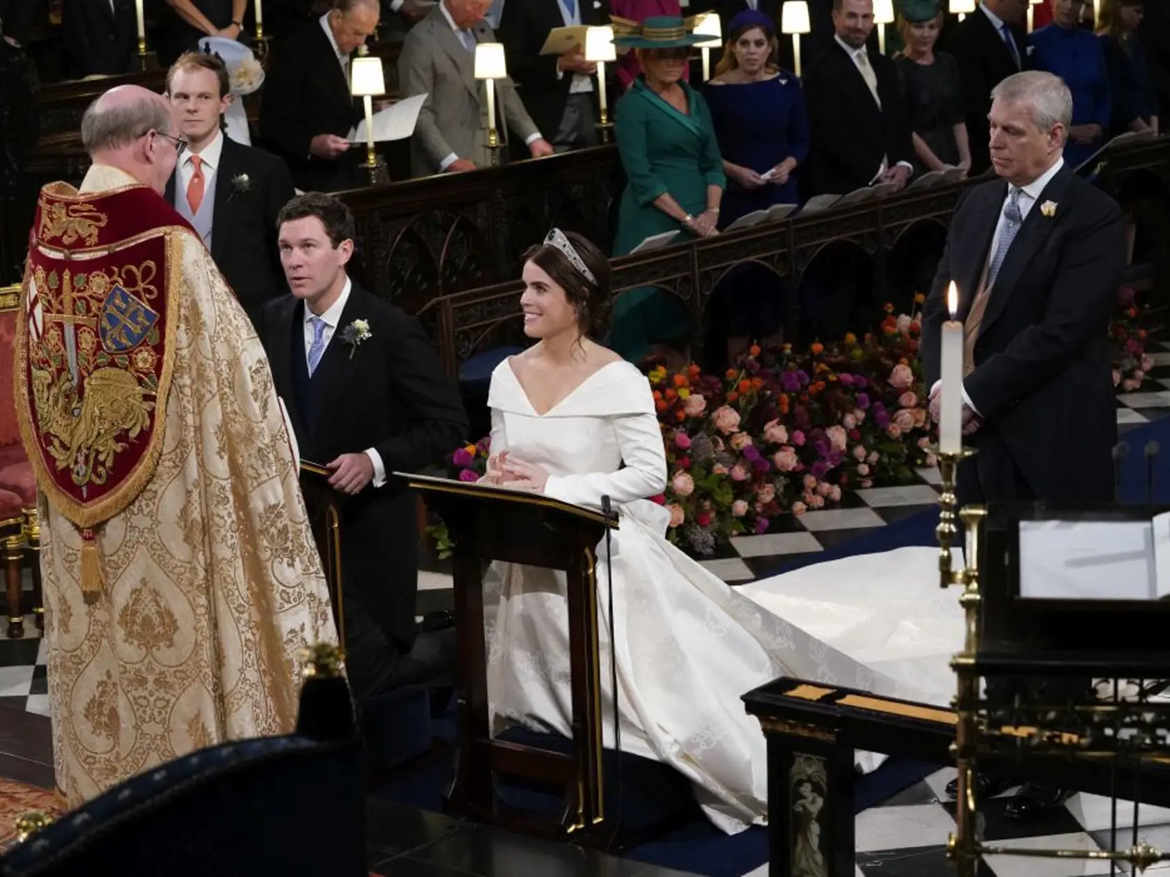 Britain's Princess Eugenie and Jack Brooksbank during their wedding ceremony in St Georgeâs Chapel, Windsor Castle, near London, England, Friday Oct. 12, 2018. (Danny Lawson/Pool via AP)